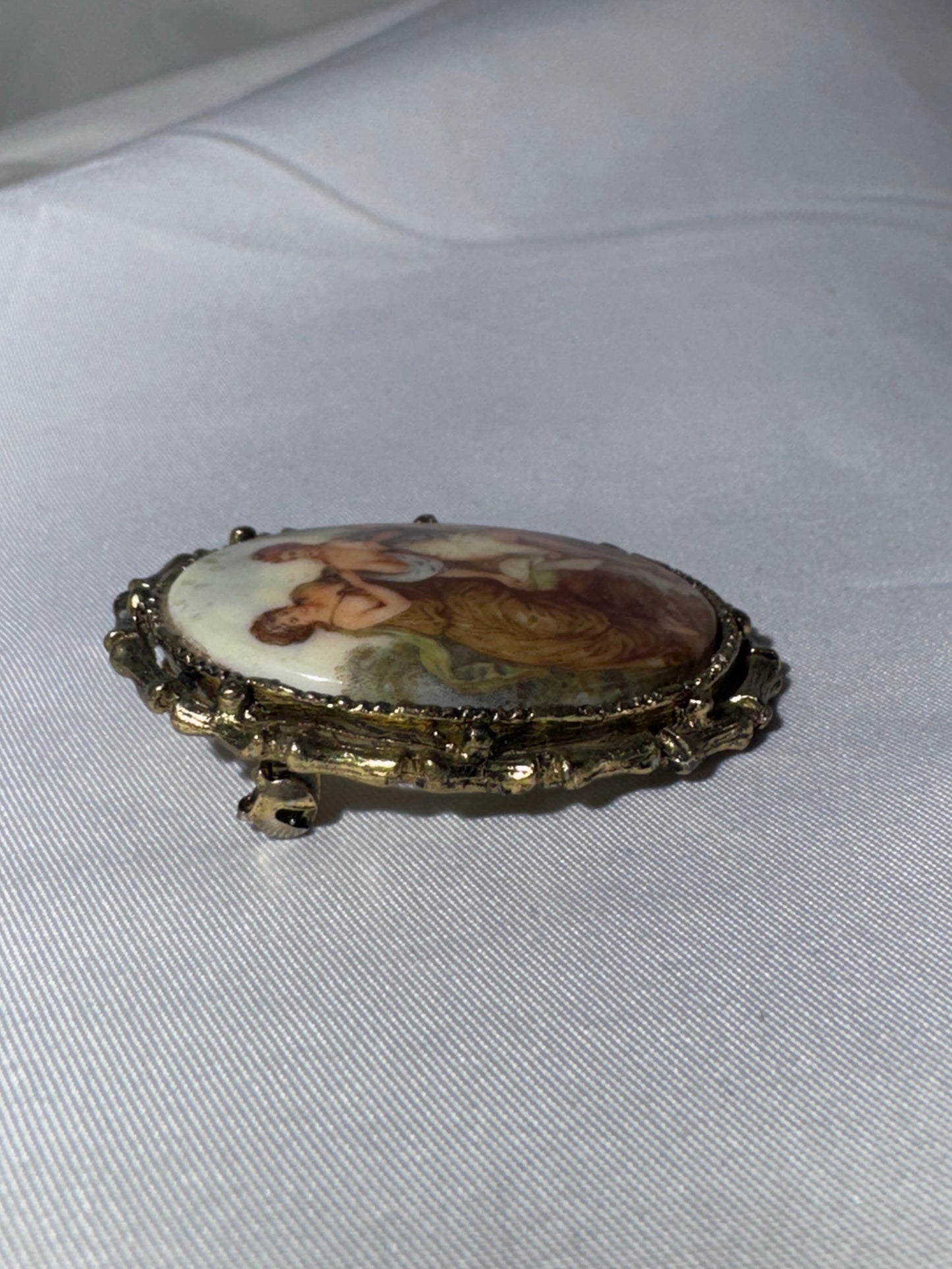 Vintage French Limoges Porcelain Miniature Brooch – Classical Mythology Scene – Ornate Gold-Tone Frame