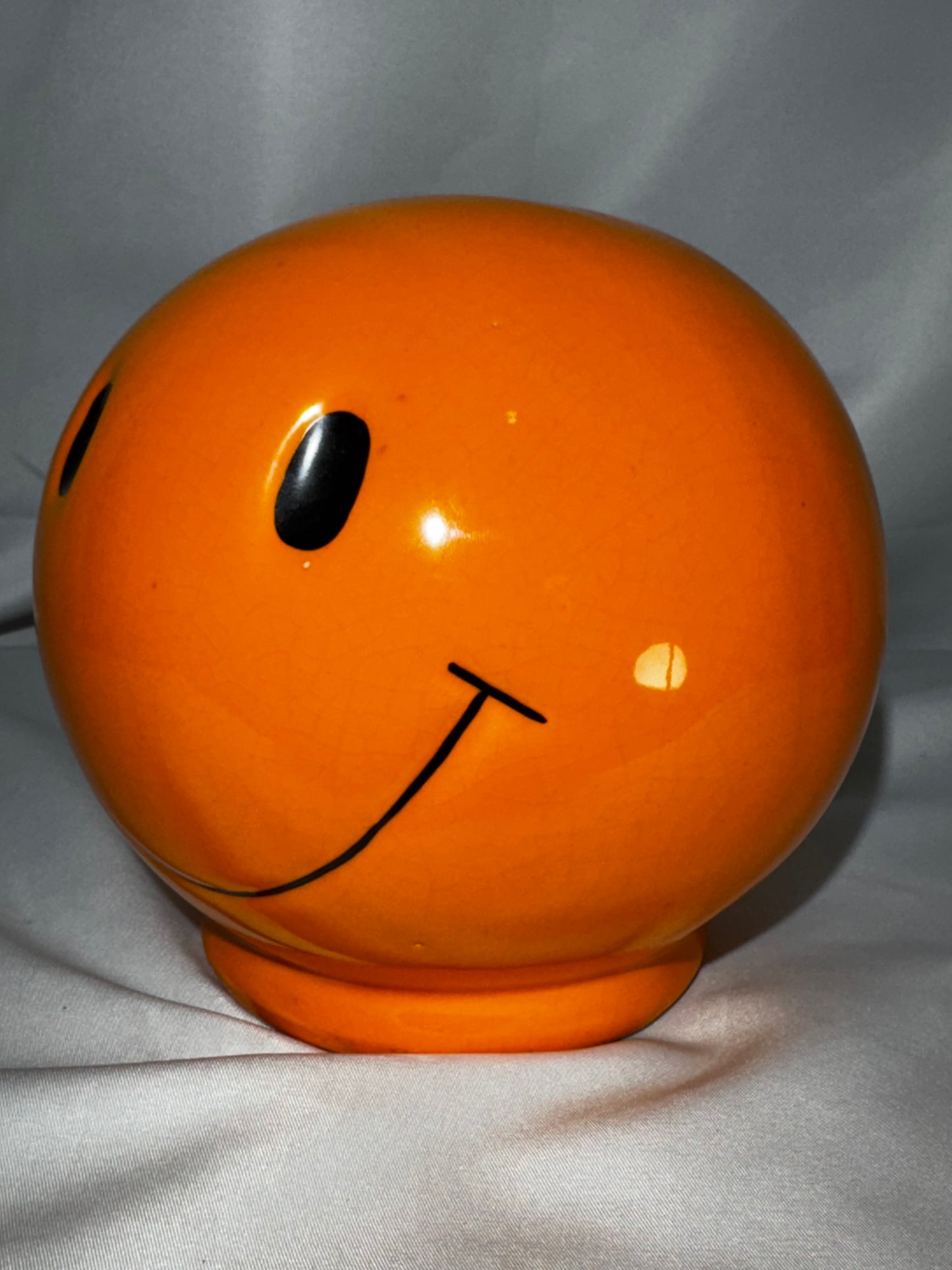 Vintage orange Smiley Face Ceramic Coin Bank