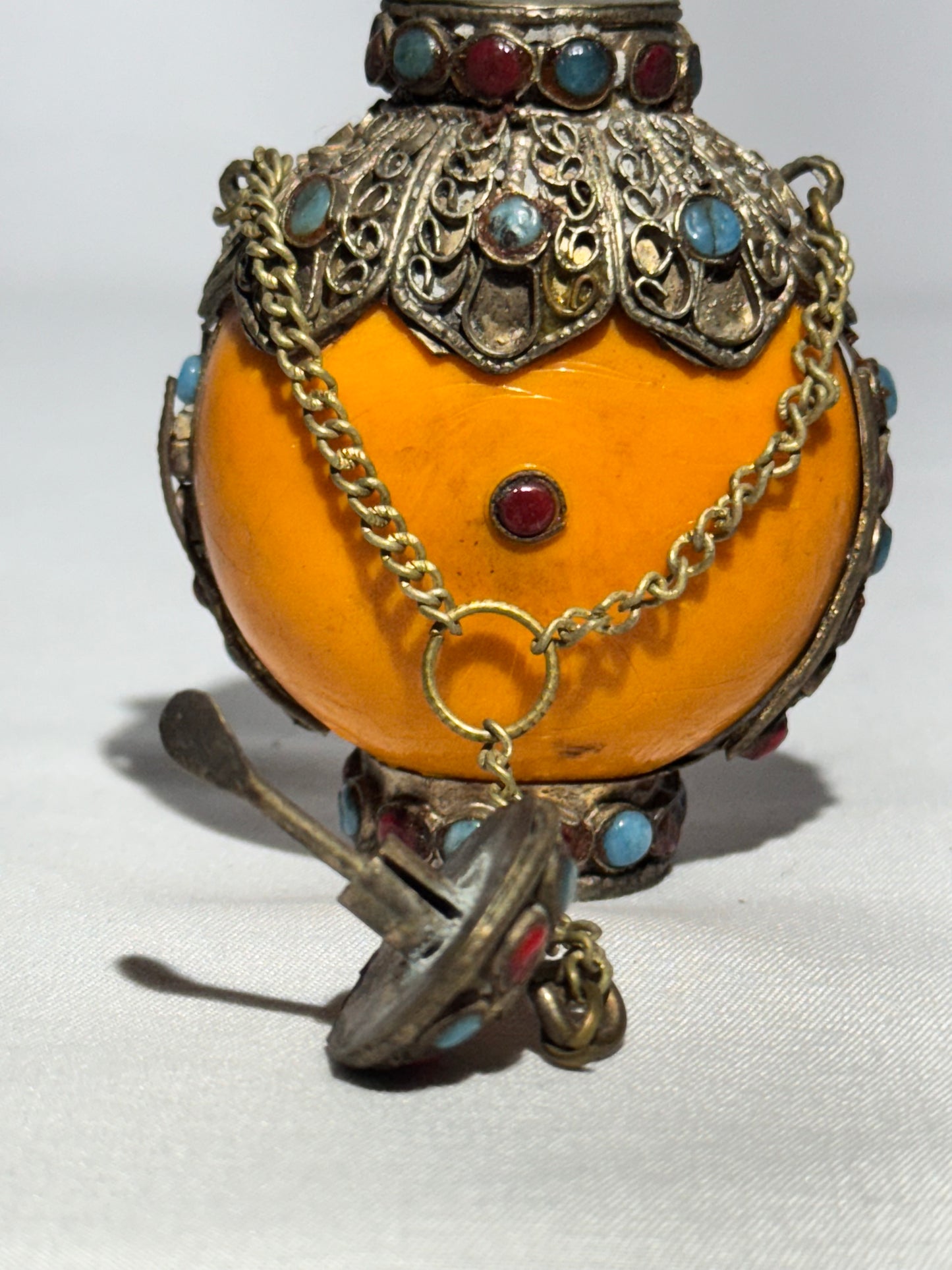 Antique Tibetan Silver Snuff Bottle with Coral and Turquoise Inlay – Ornate Metalwork & Chain Stopper