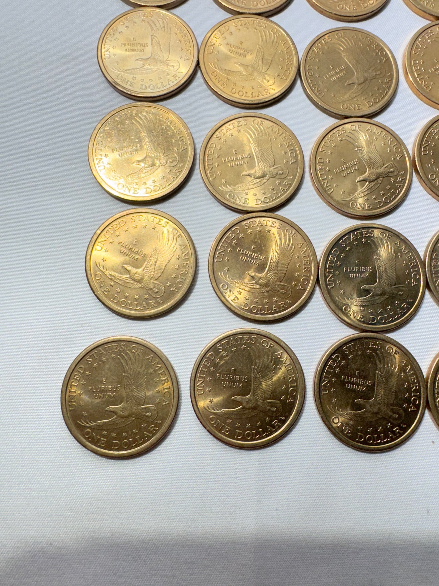 Lot of 25 United States Sacagawea One Dollar Coins – 2000, 2001 & 2002 – One Colorized Coin Included