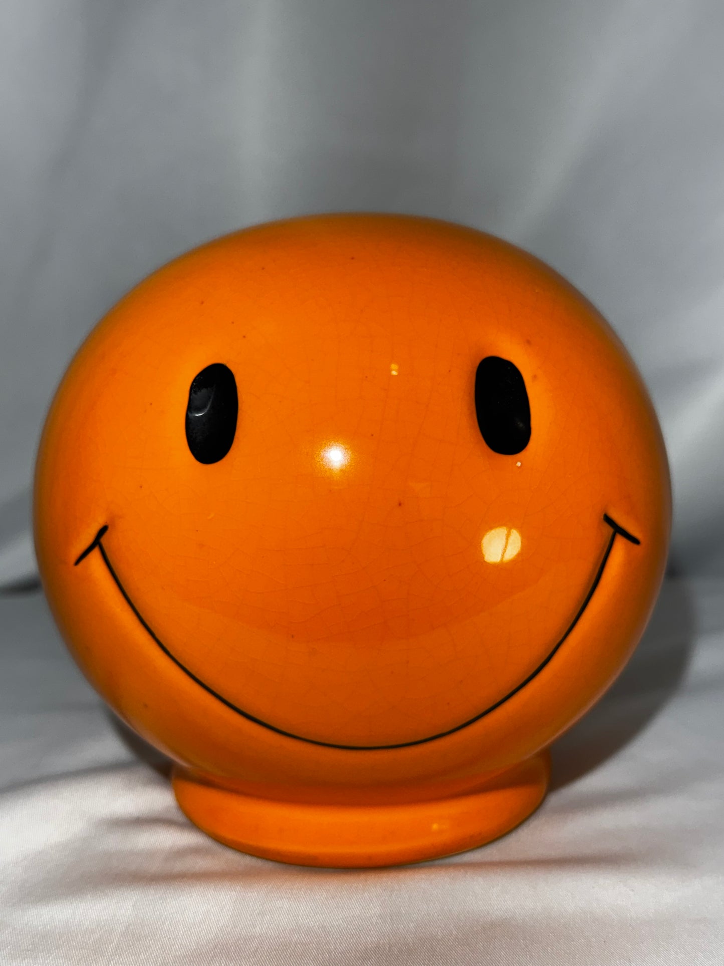 Vintage orange Smiley Face Ceramic Coin Bank