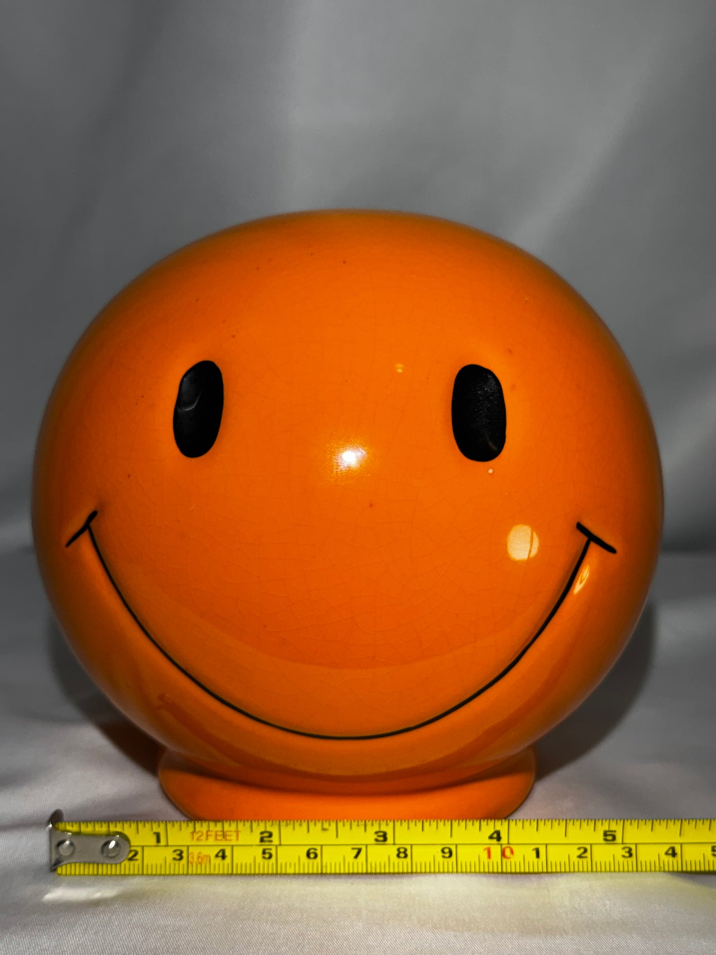 Vintage orange Smiley Face Ceramic Coin Bank