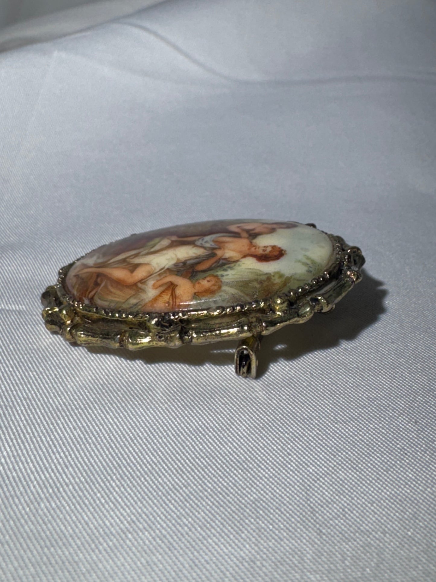 Vintage French Limoges Porcelain Miniature Brooch – Classical Mythology Scene – Ornate Gold-Tone Frame