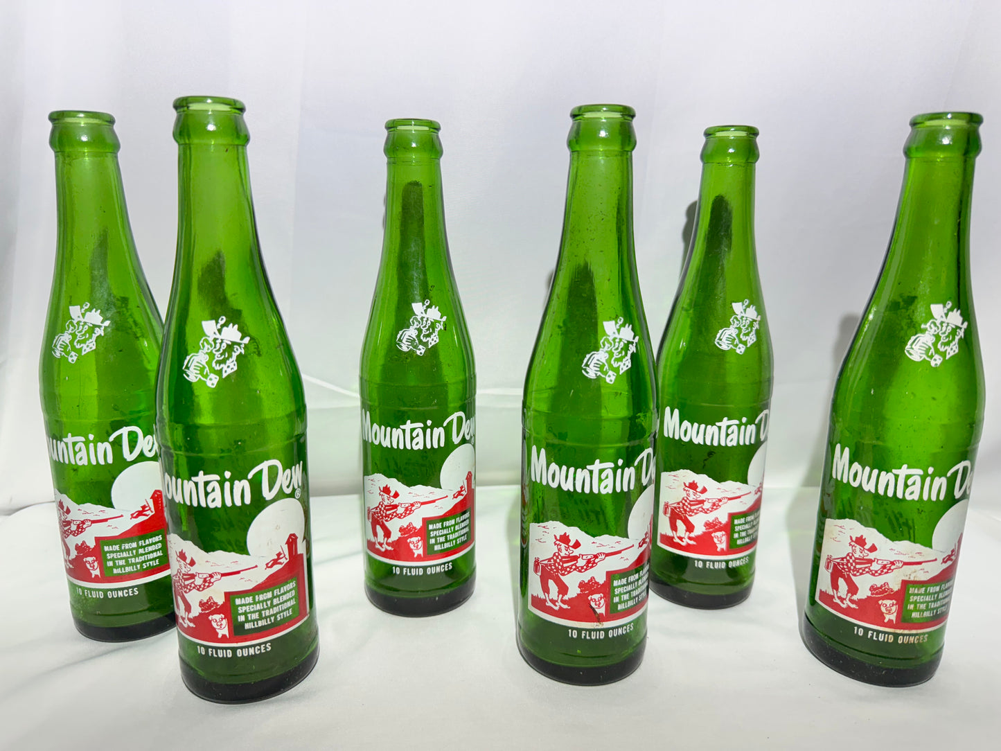 Rare Vintage Mountain Dew Green Glass Bottles – 10 fl oz – Hillbilly Slogan Graphics 6pack