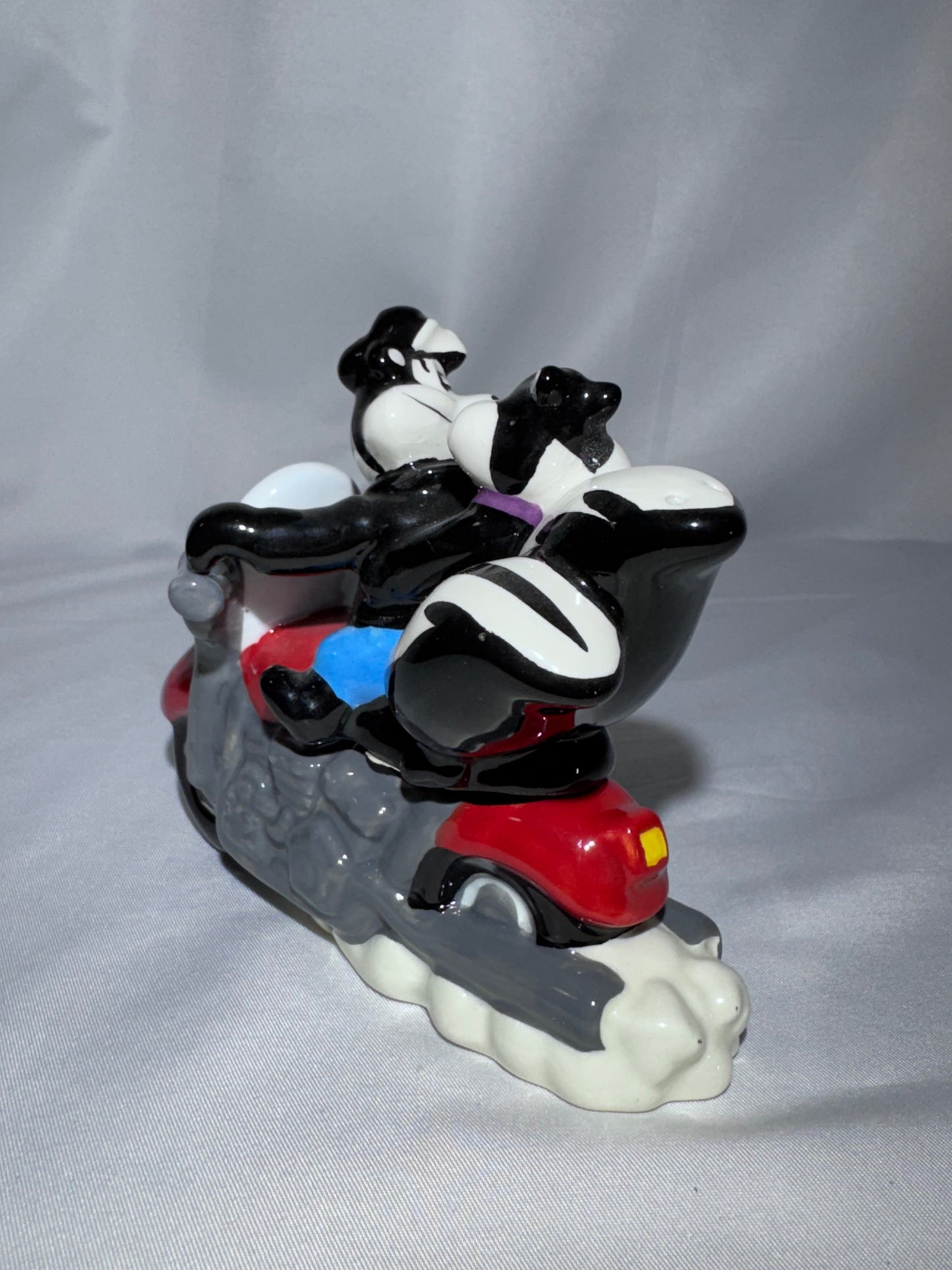 2009 Westland Looney Tunes Pepe Le Pew Penelope and motorcycle Magnetic Shakers Box