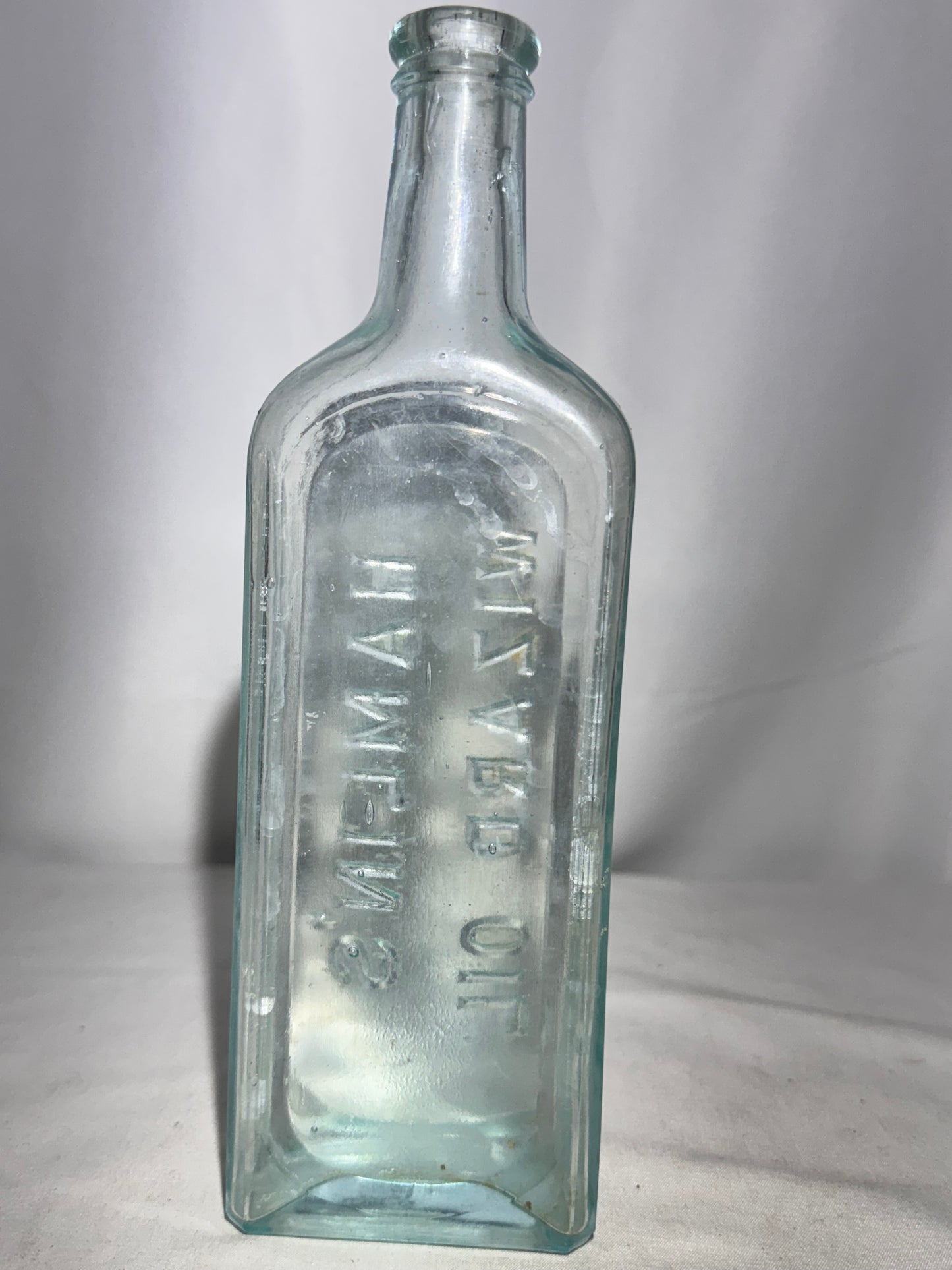 Vintage Hamlin’s Wizard Oil Embossed Glass Bottle – Antique Patent Medicine (1800s–Early 1900s)