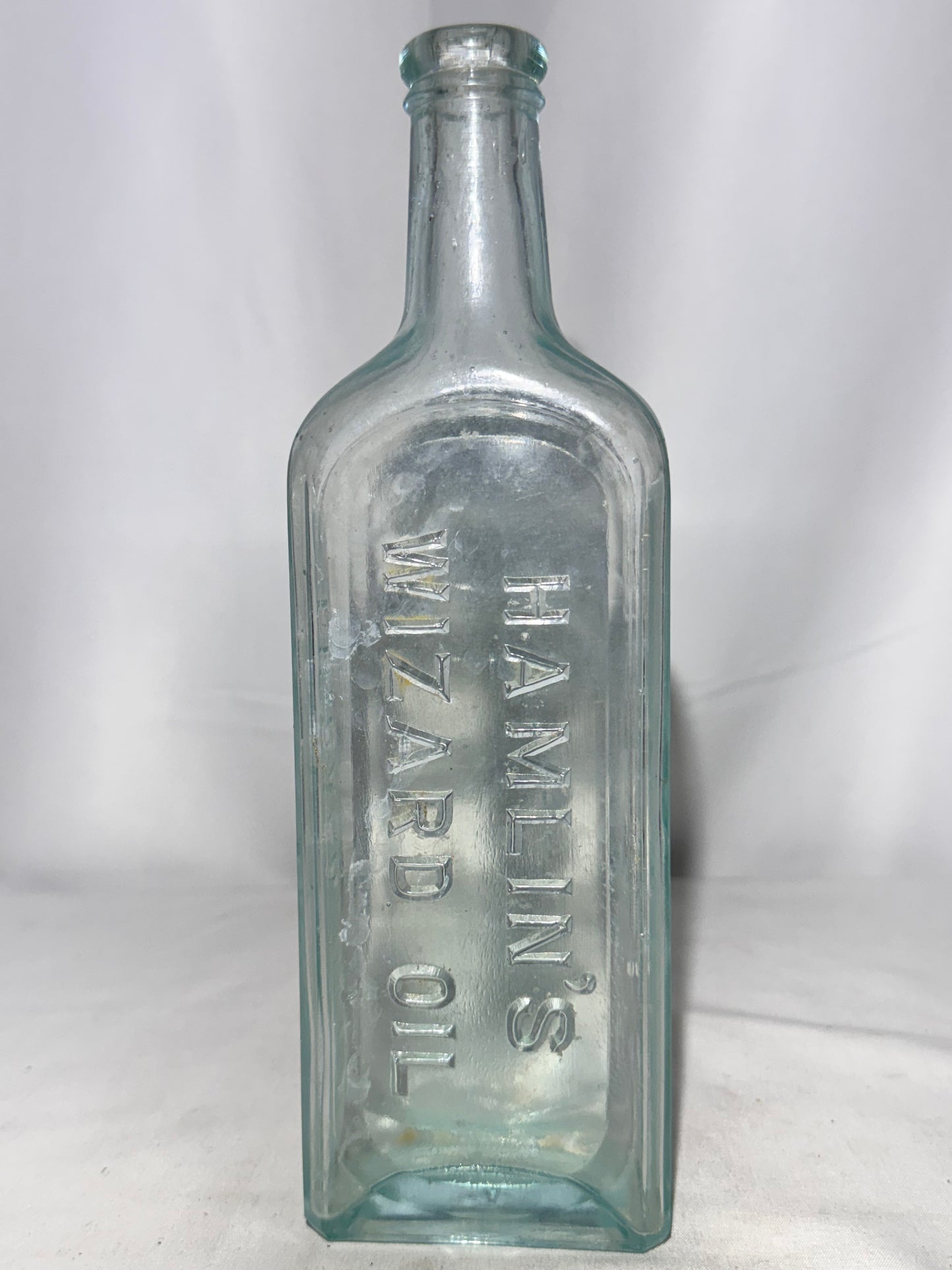 Vintage Hamlin’s Wizard Oil Embossed Glass Bottle – Antique Patent Medicine (1800s–Early 1900s)
