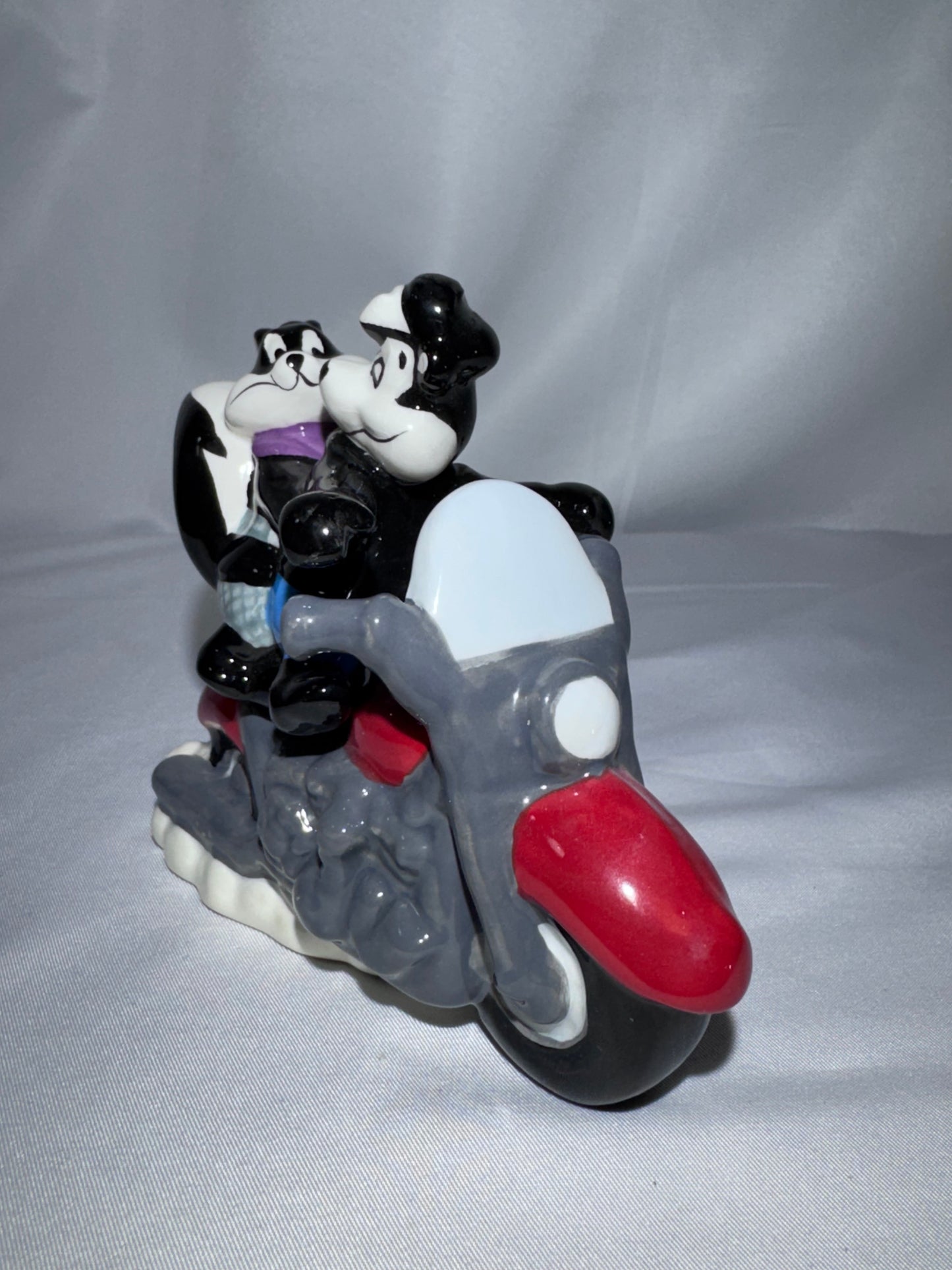2009 Westland Looney Tunes Pepe Le Pew Penelope and motorcycle Magnetic Shakers Box