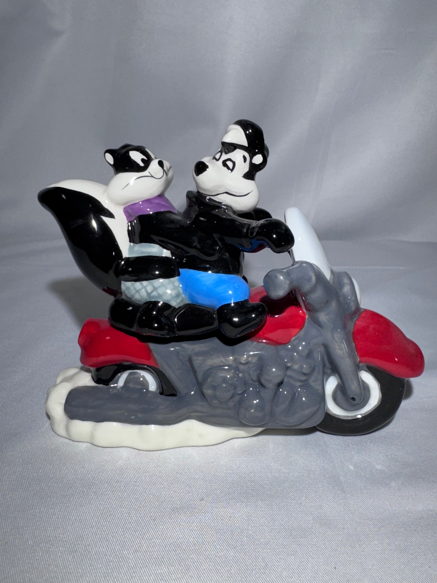 2009 Westland Looney Tunes Pepe Le Pew Penelope and motorcycle Magnetic Shakers Box