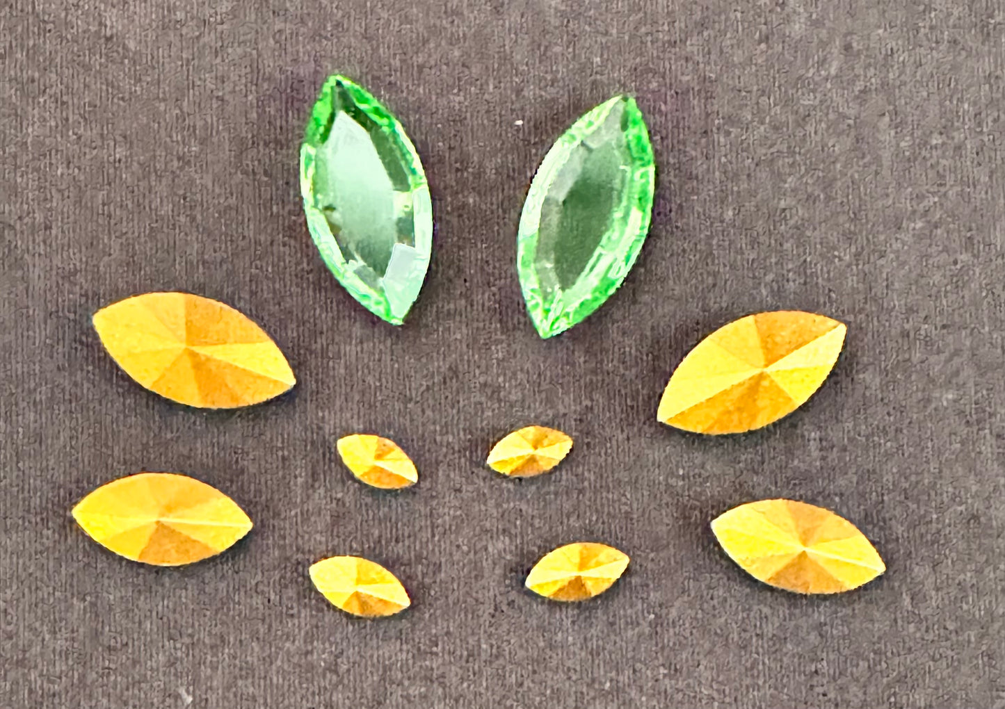 Uranium Gemstones - 10 pieces- Navette - green - some have foiled backs - each piece is unique and has its own characteristics some may have imperfections.