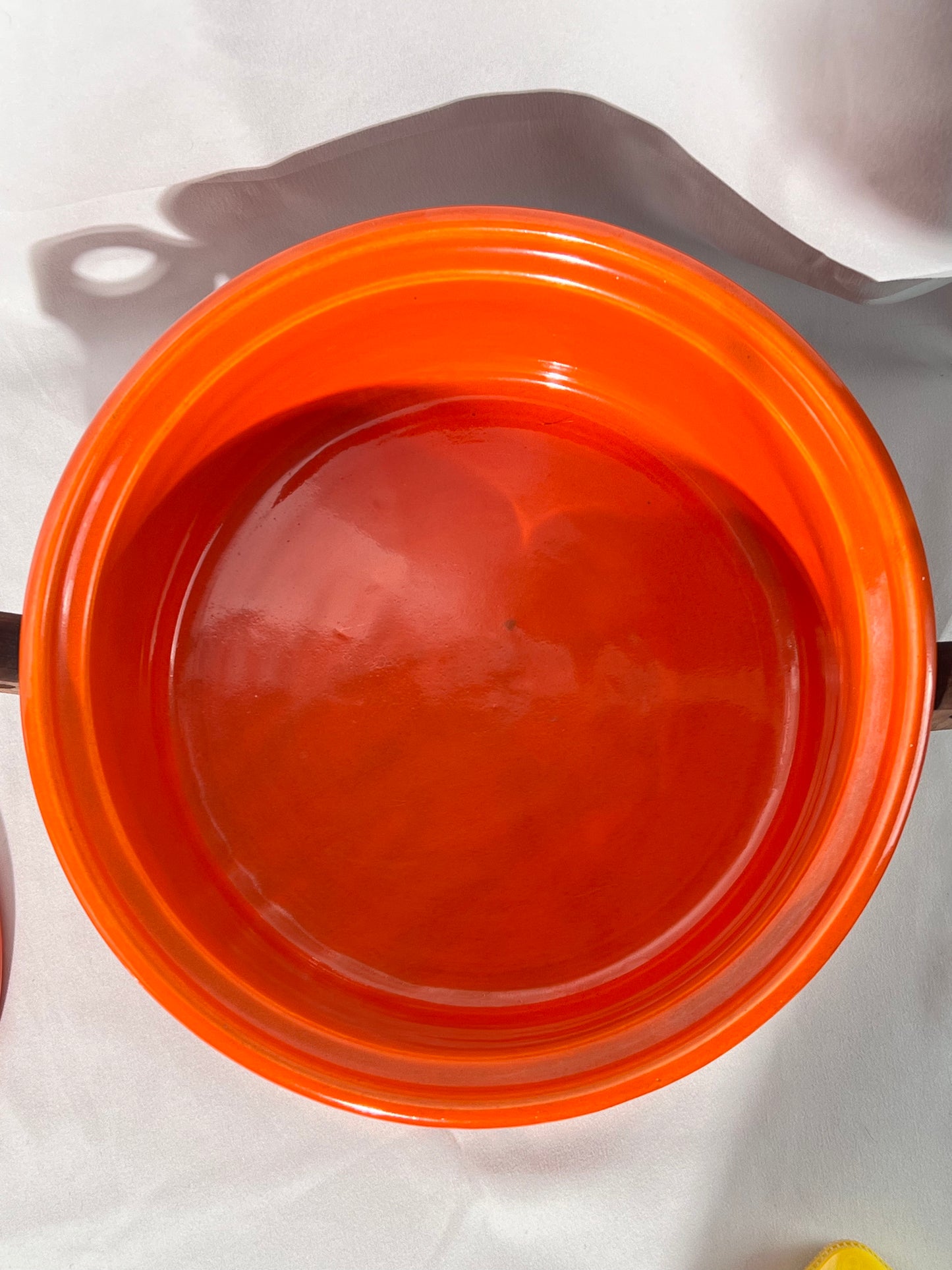 Bauer pottery- Los Angeles- 9 1/2” casserole - copper stand with wooden handles- Vintage - Orange