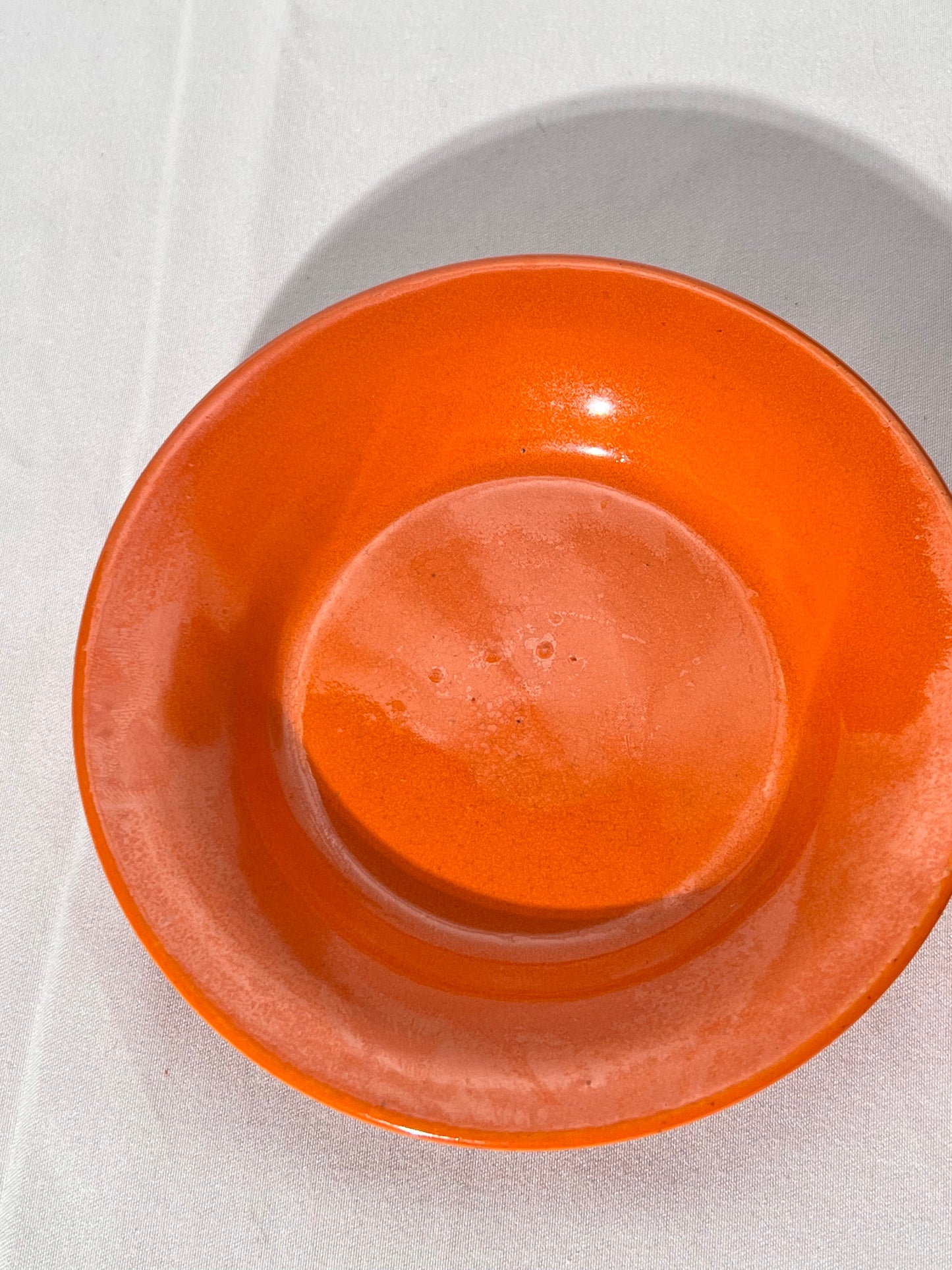 Bauer Pottery- vintage- orange- 4 1/2” saucers - set of 2
