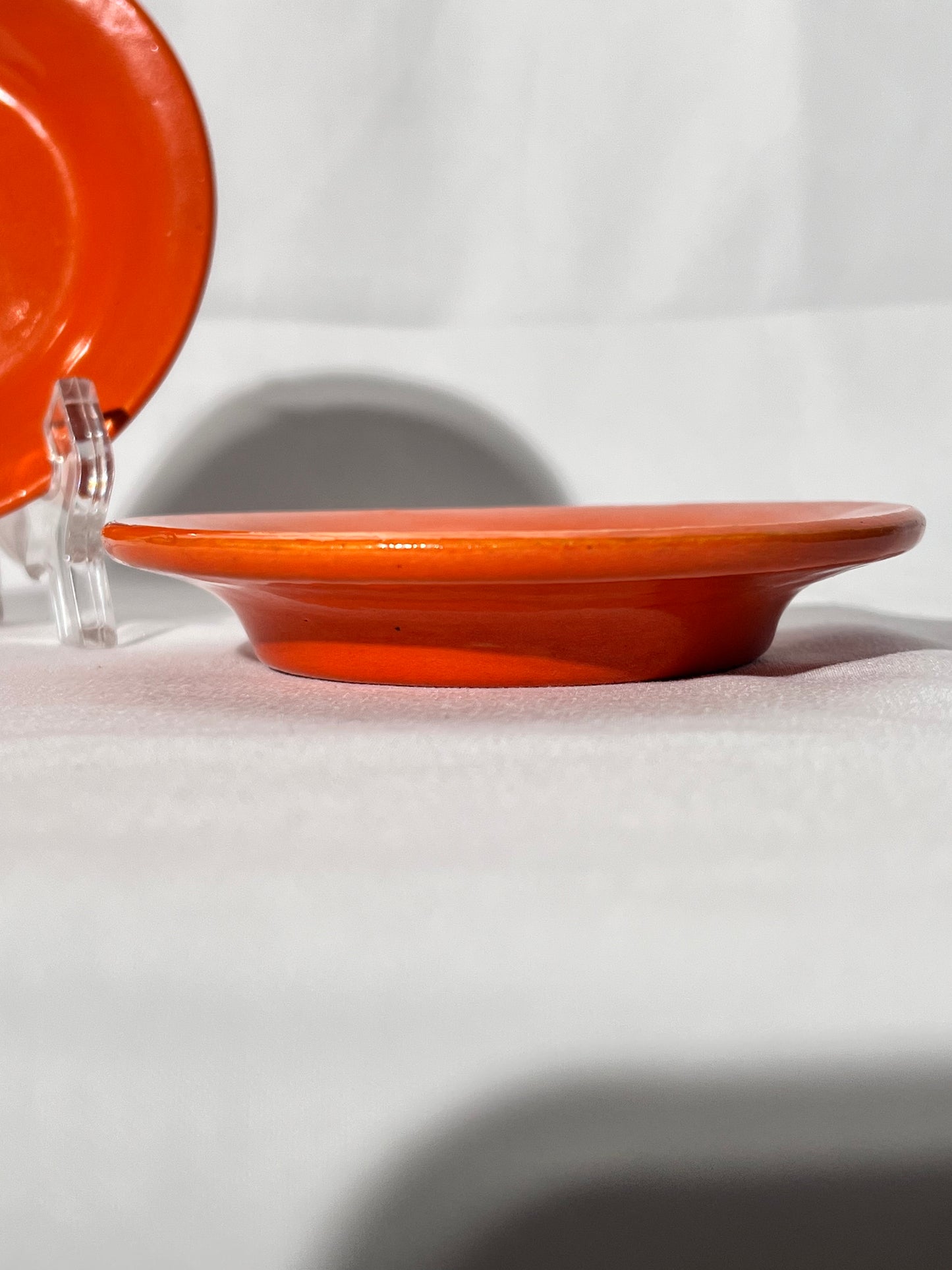 Bauer Pottery- vintage- orange- 4 1/2” saucers - set of 2
