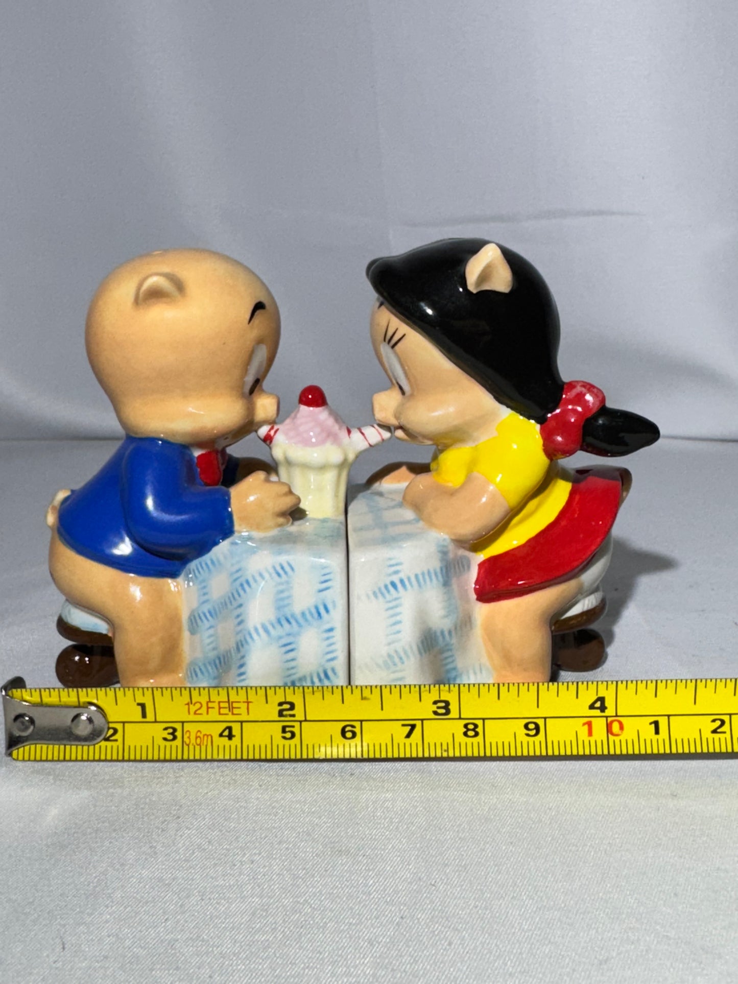 Porky Pig and Petunia -salt and pepper shakers-magnetic- Warner Brothers-Looney Tunes