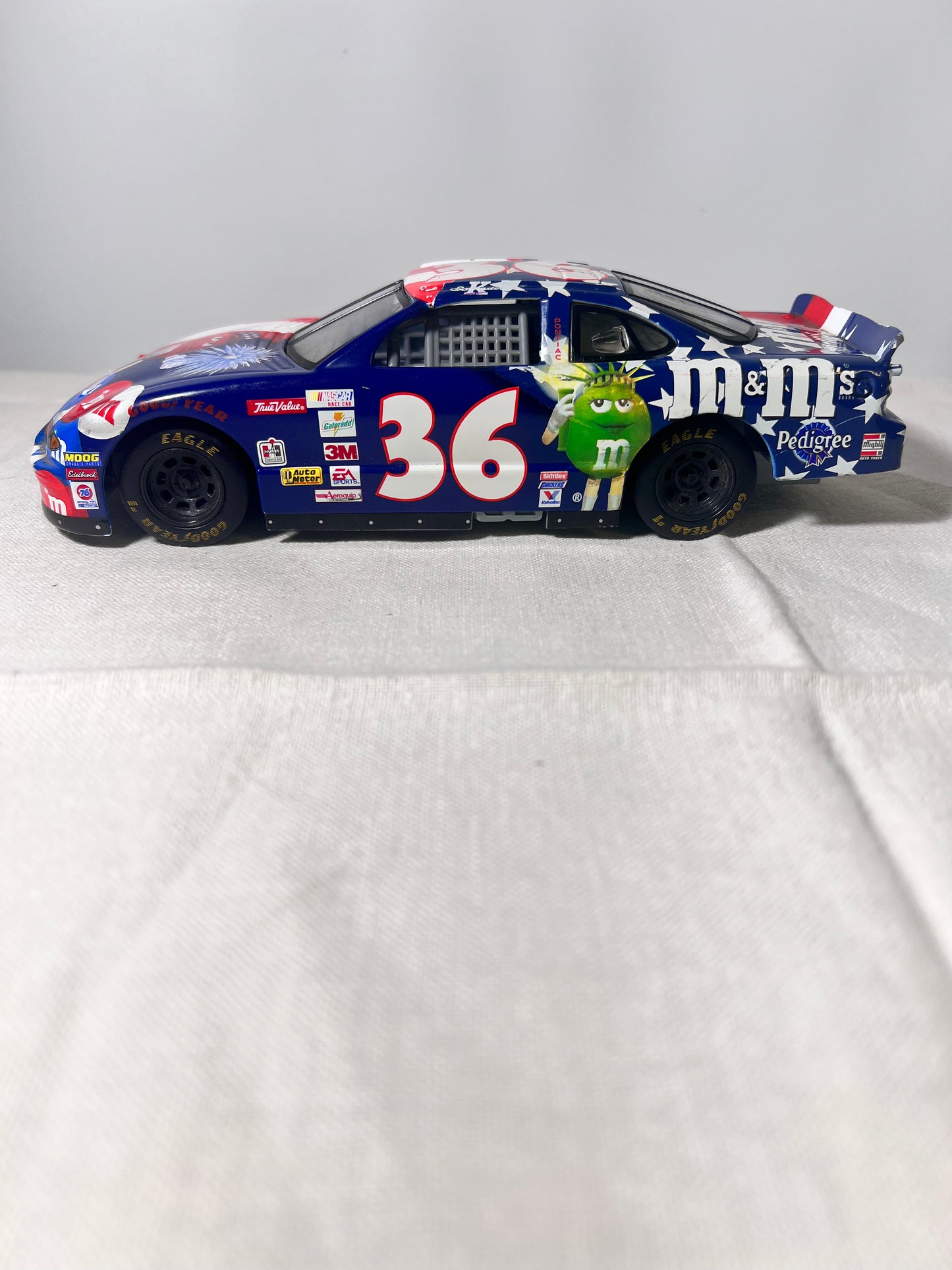 # 36- M&M-Die Cast Car- Racing Champion-2000- Pontiac-Grand Prix- Red, White and Blue-NASCAR