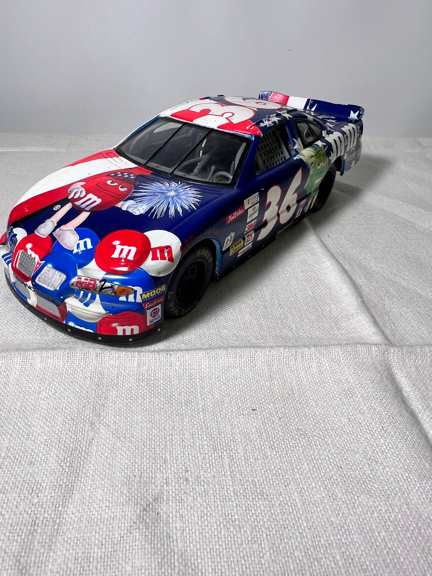 # 36- M&M-Die Cast Car- Racing Champion-2000- Pontiac-Grand Prix- Red, White and Blue-NASCAR