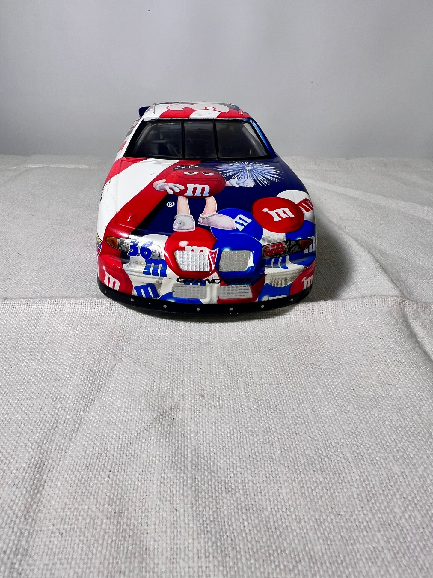# 36- M&M-Die Cast Car- Racing Champion-2000- Pontiac-Grand Prix- Red, White and Blue-NASCAR