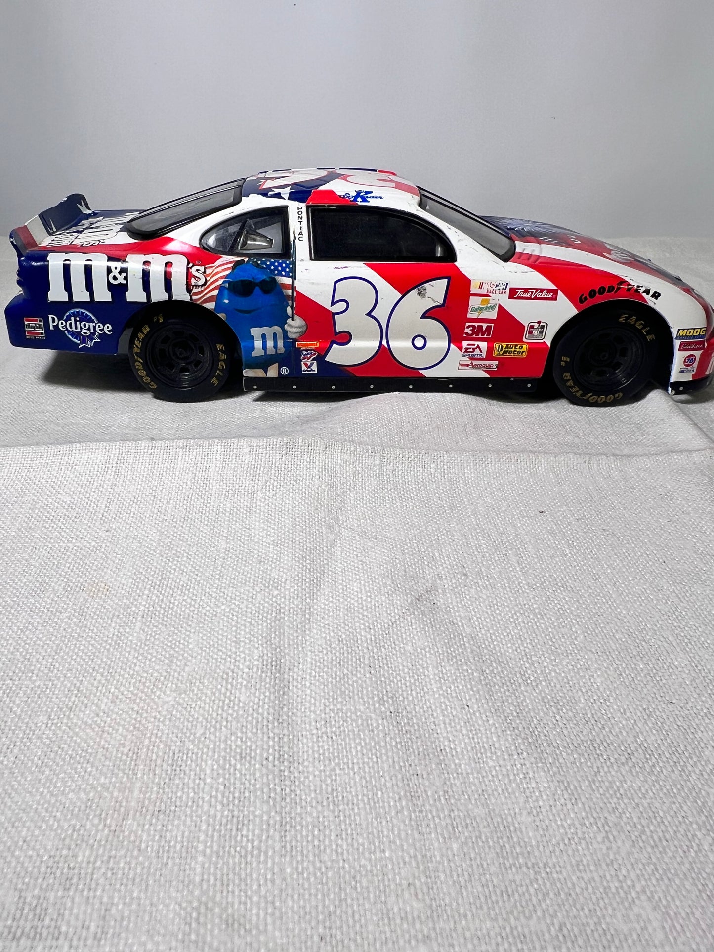 # 36- M&M-Die Cast Car- Racing Champion-2000- Pontiac-Grand Prix- Red, White and Blue-NASCAR