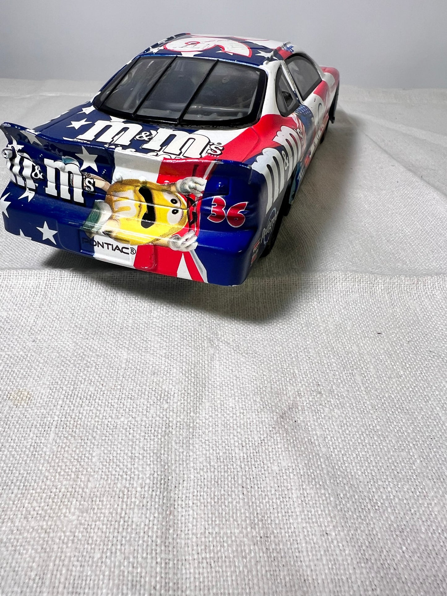 # 36- M&M-Die Cast Car- Racing Champion-2000- Pontiac-Grand Prix- Red, White and Blue-NASCAR