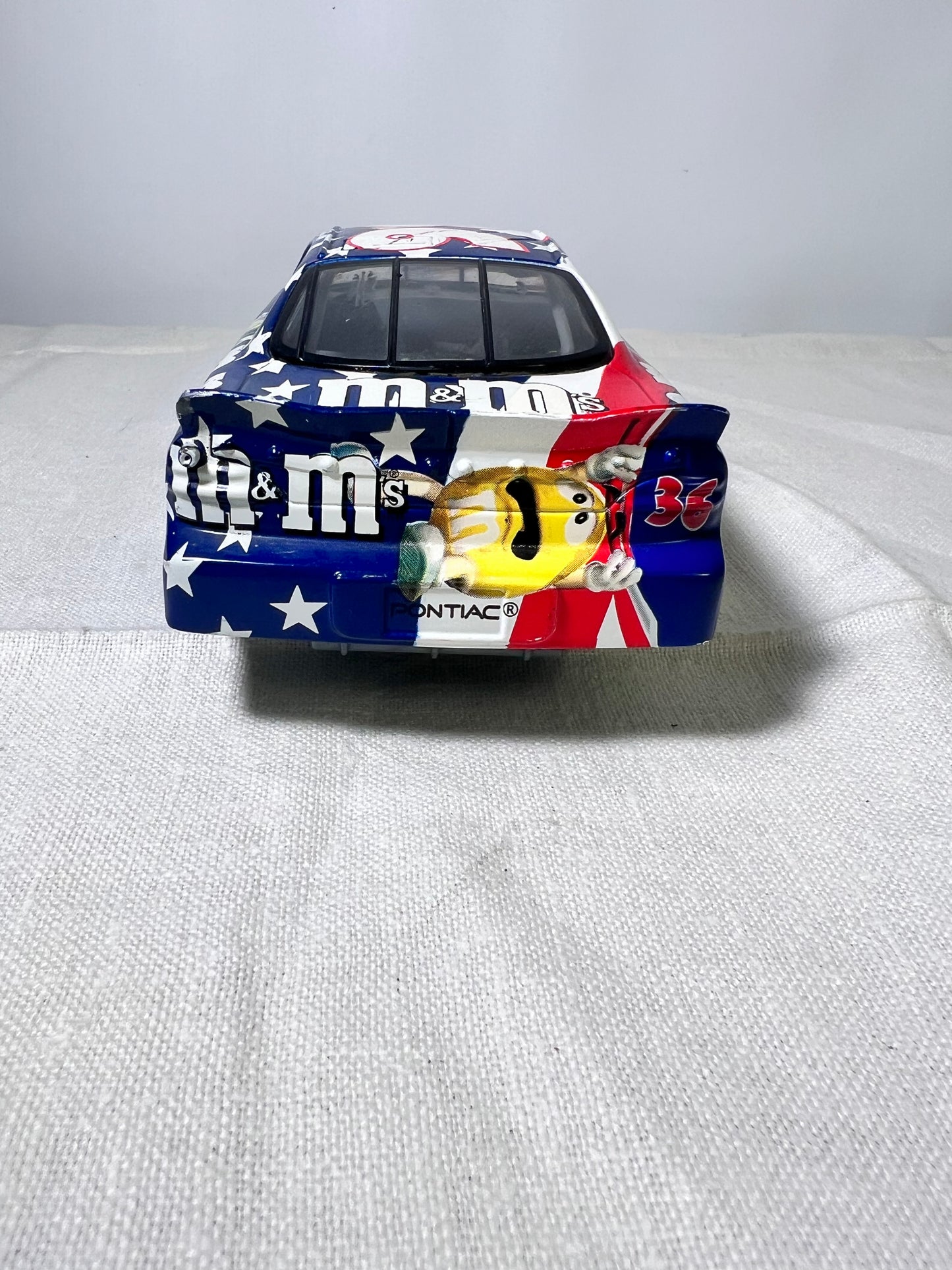 # 36- M&M-Die Cast Car- Racing Champion-2000- Pontiac-Grand Prix- Red, White and Blue-NASCAR