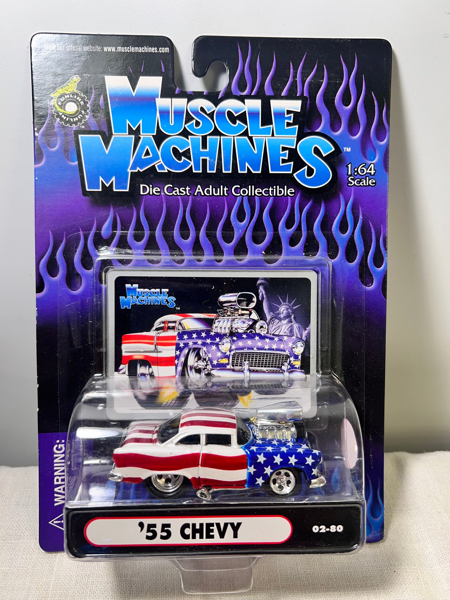 Muscle machines- ‘55 Chevy- 02-80  -die cast 1:64 scale - American Flag