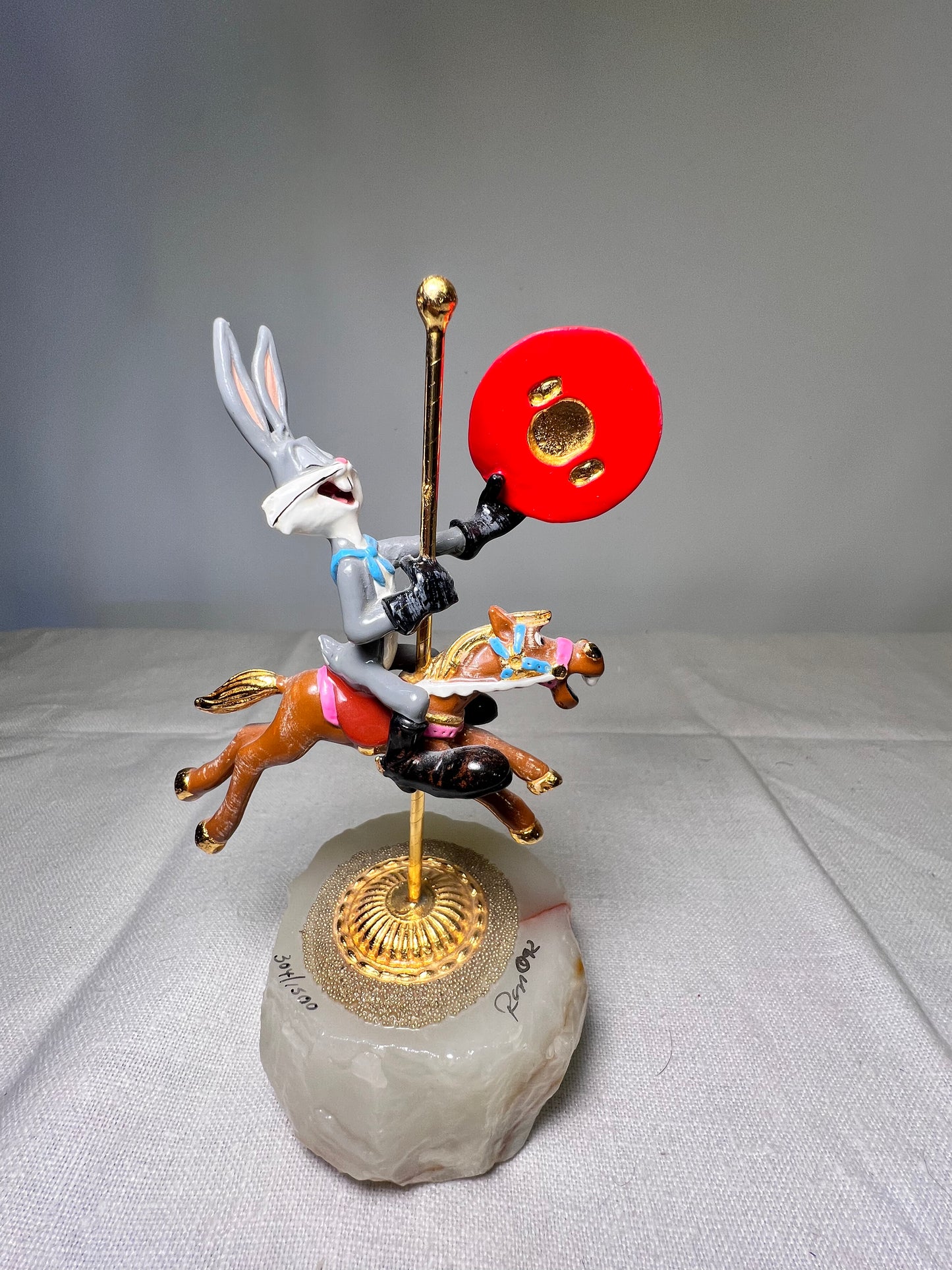 Ron Lee - Bugs Bunny on a carousel horse -6“ statue-1992 -signed and numbered 304/1500 Looney Tunes – Warner Brothers – stone base ￼