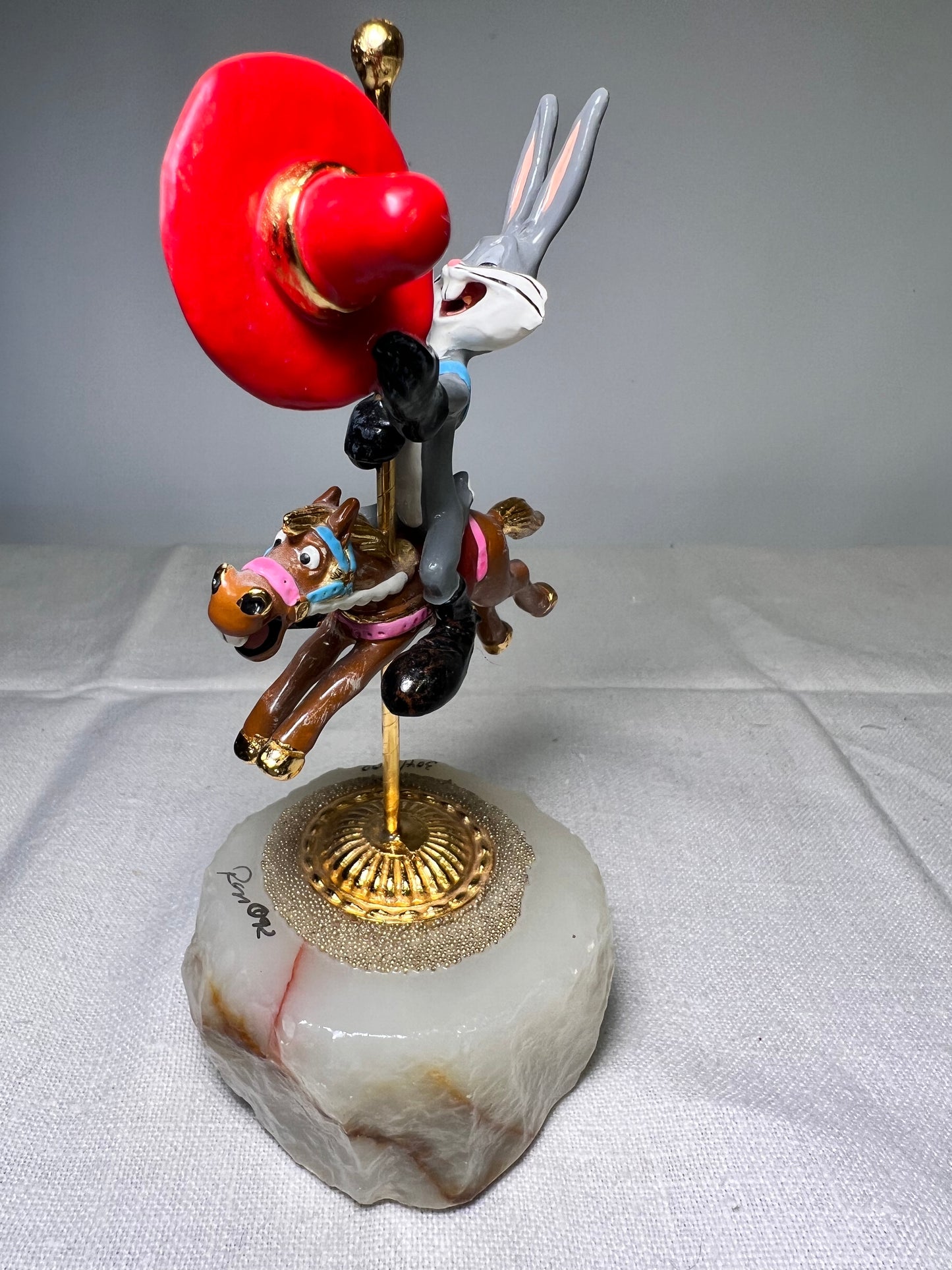 Ron Lee - Bugs Bunny on a carousel horse -6“ statue-1992 -signed and numbered 304/1500 Looney Tunes – Warner Brothers – stone base ￼