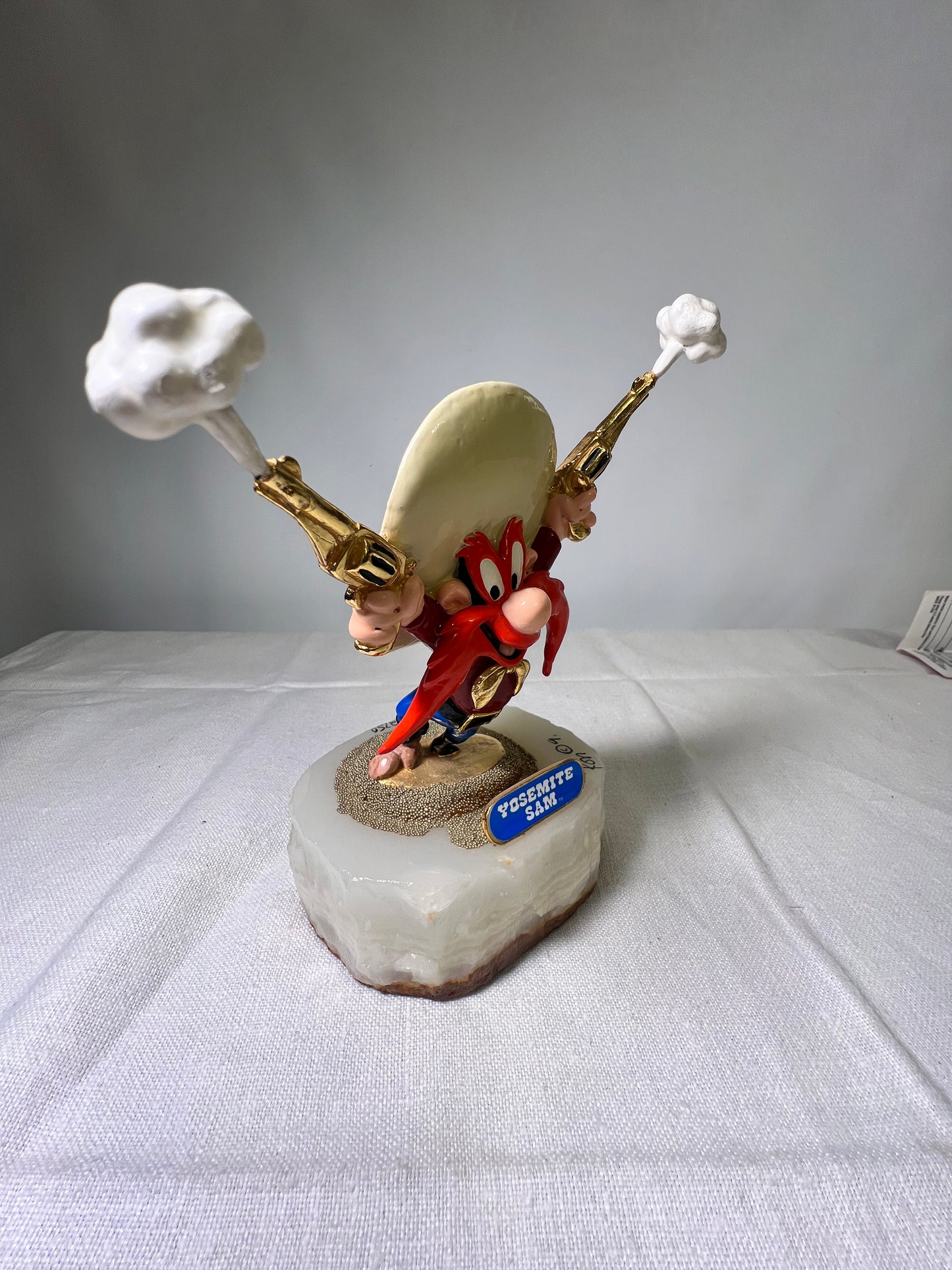 Ron Lee- Yosemite Sam - guns and smoke- 5.5” statue- signed and numbered 356/2750 -Looney Tunes-Warner Brothers- stone base