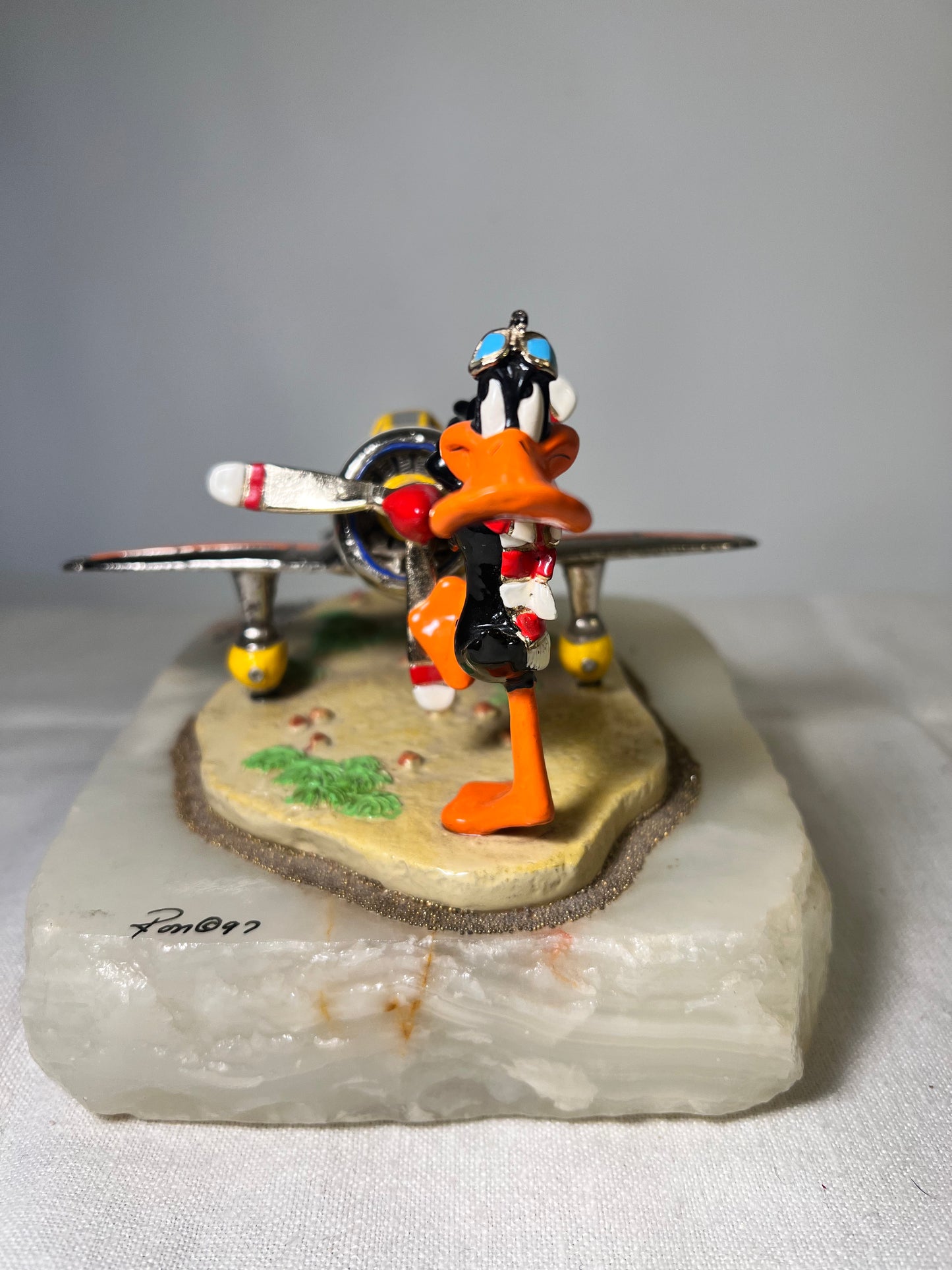 Ron Lee- Daffy Duck - The Baron -air Plane- signed and numbered 459/750- 1997 - Looney Tunes-Warner Brothers- stone base- 5” statue