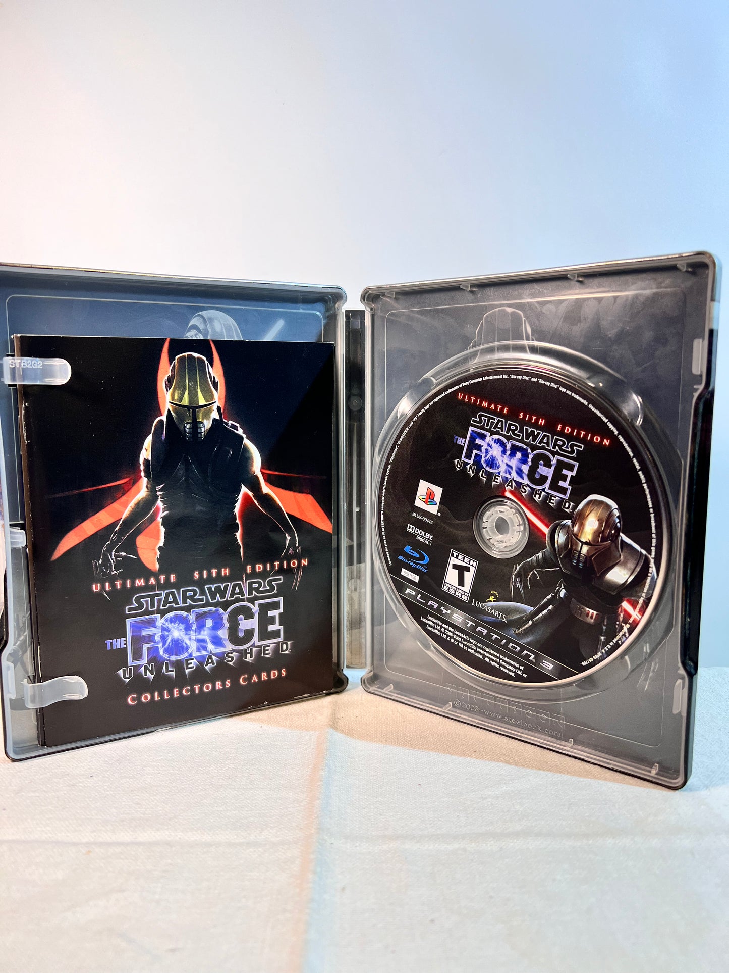 PlayStation - Star Wars The Force Unleashed- ultimate Sith Edition- Rate T - metal case, game and instruction manual