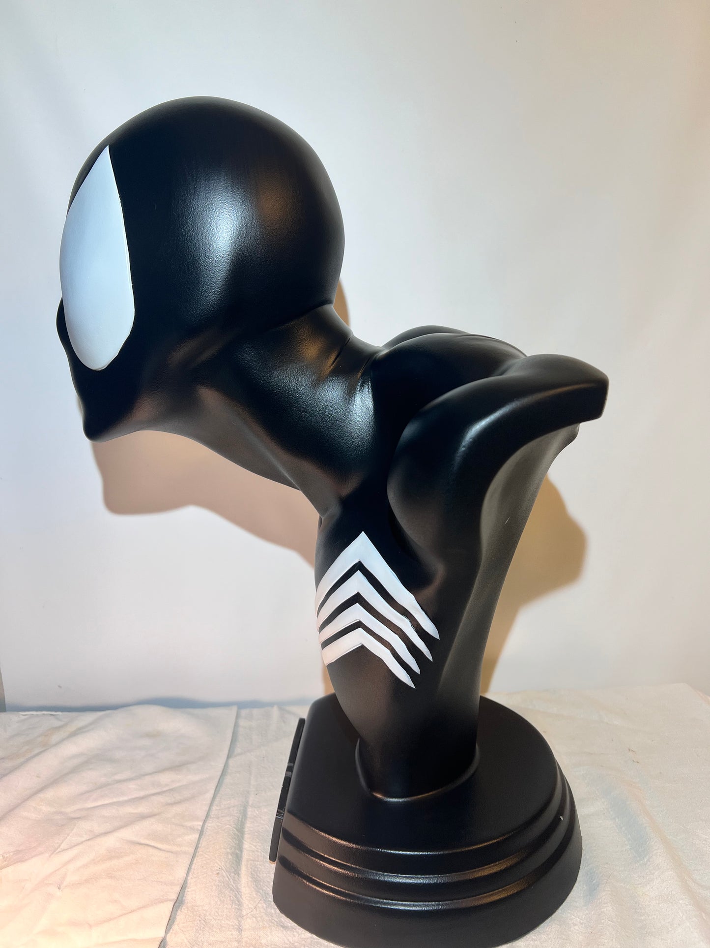 Spider Man- 21.5” bust - Black Suit, light gray spider and eyes- black base with white logo plaque- Hollow plastic resin