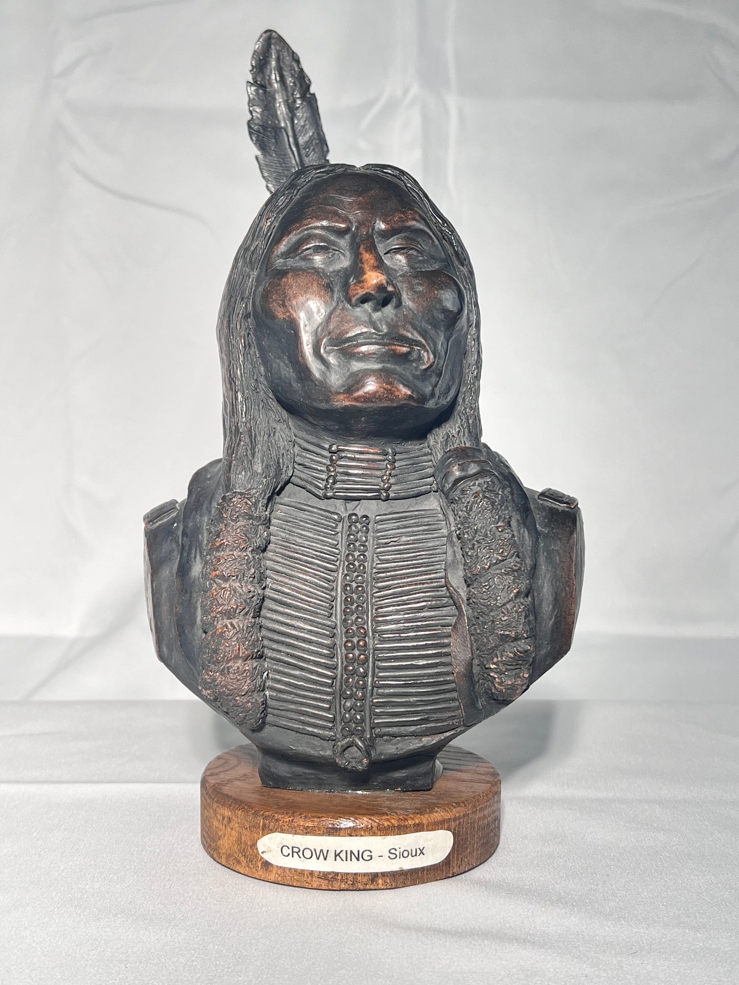 Phil Bishop - 11 1/2” bust - Crow King - Sioux- Native American sculpture- casted stone- wood base