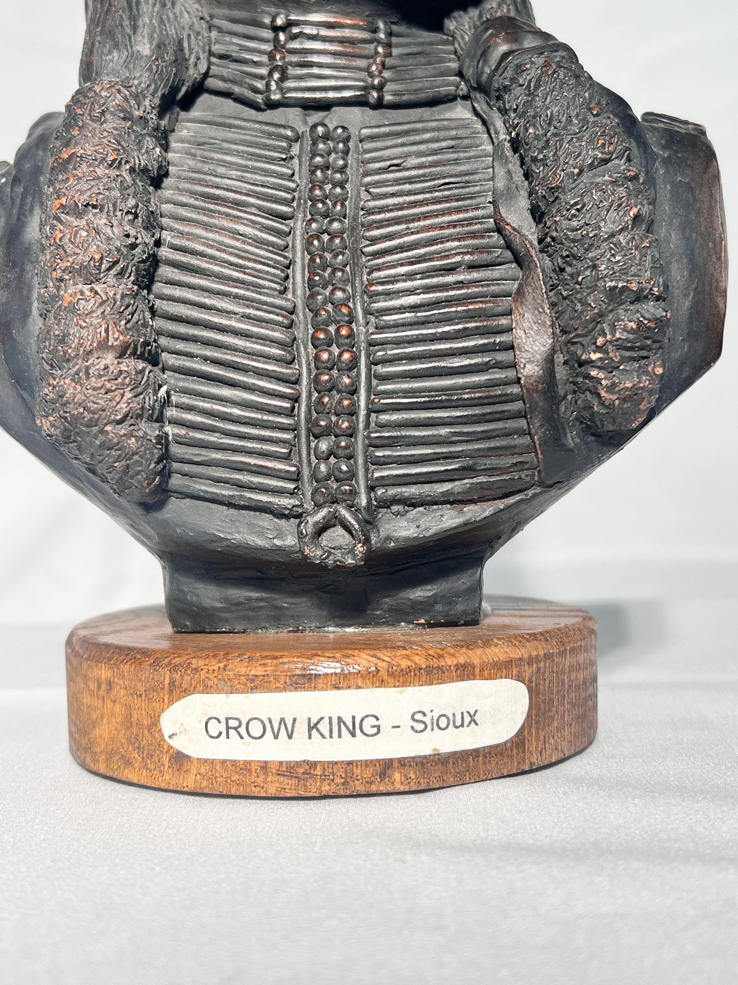 Phil Bishop - 11 1/2” bust - Crow King - Sioux- Native American sculpture- casted stone- wood base