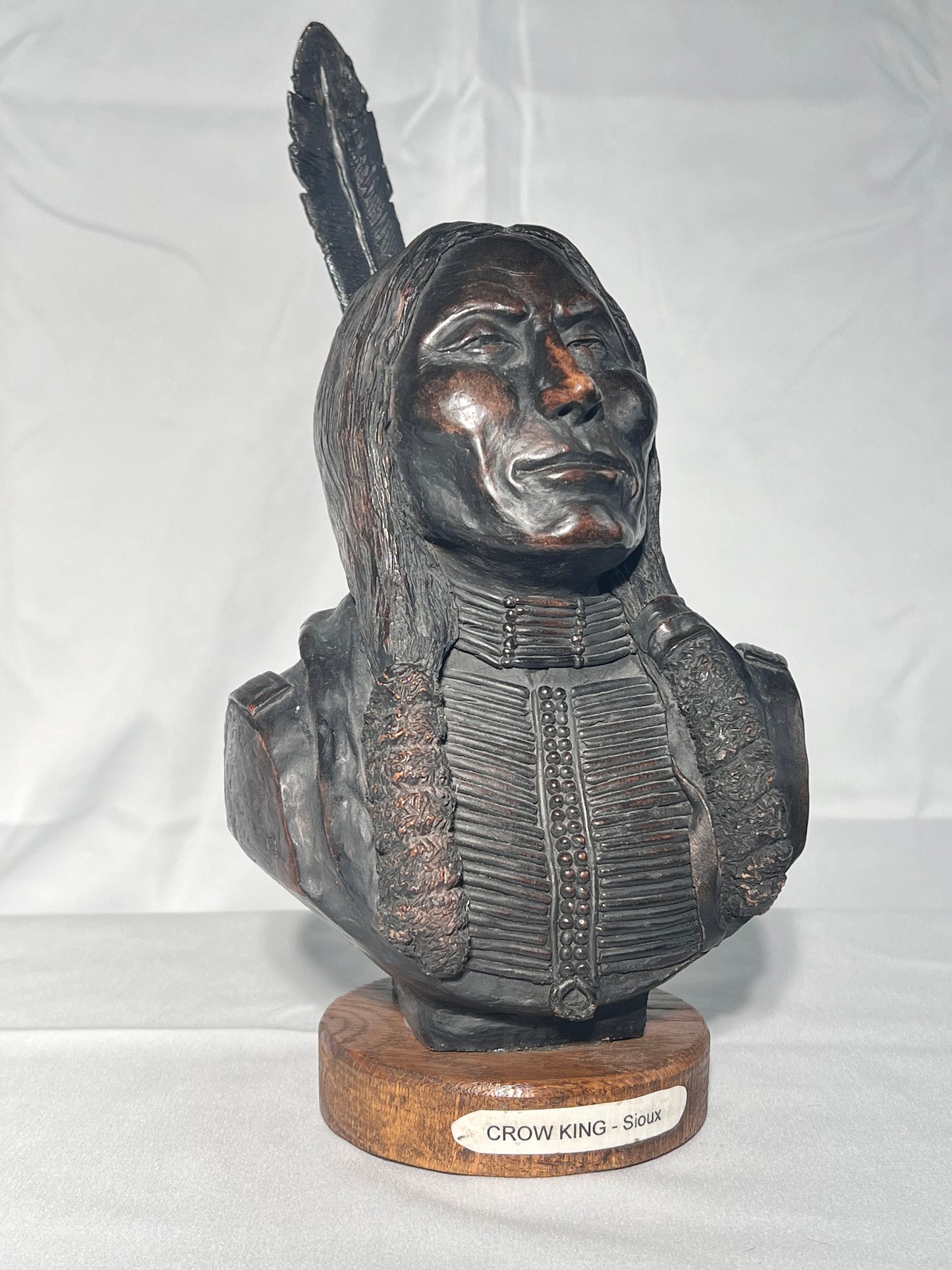 Phil Bishop - 11 1/2” bust - Crow King - Sioux- Native American sculpture- casted stone- wood base