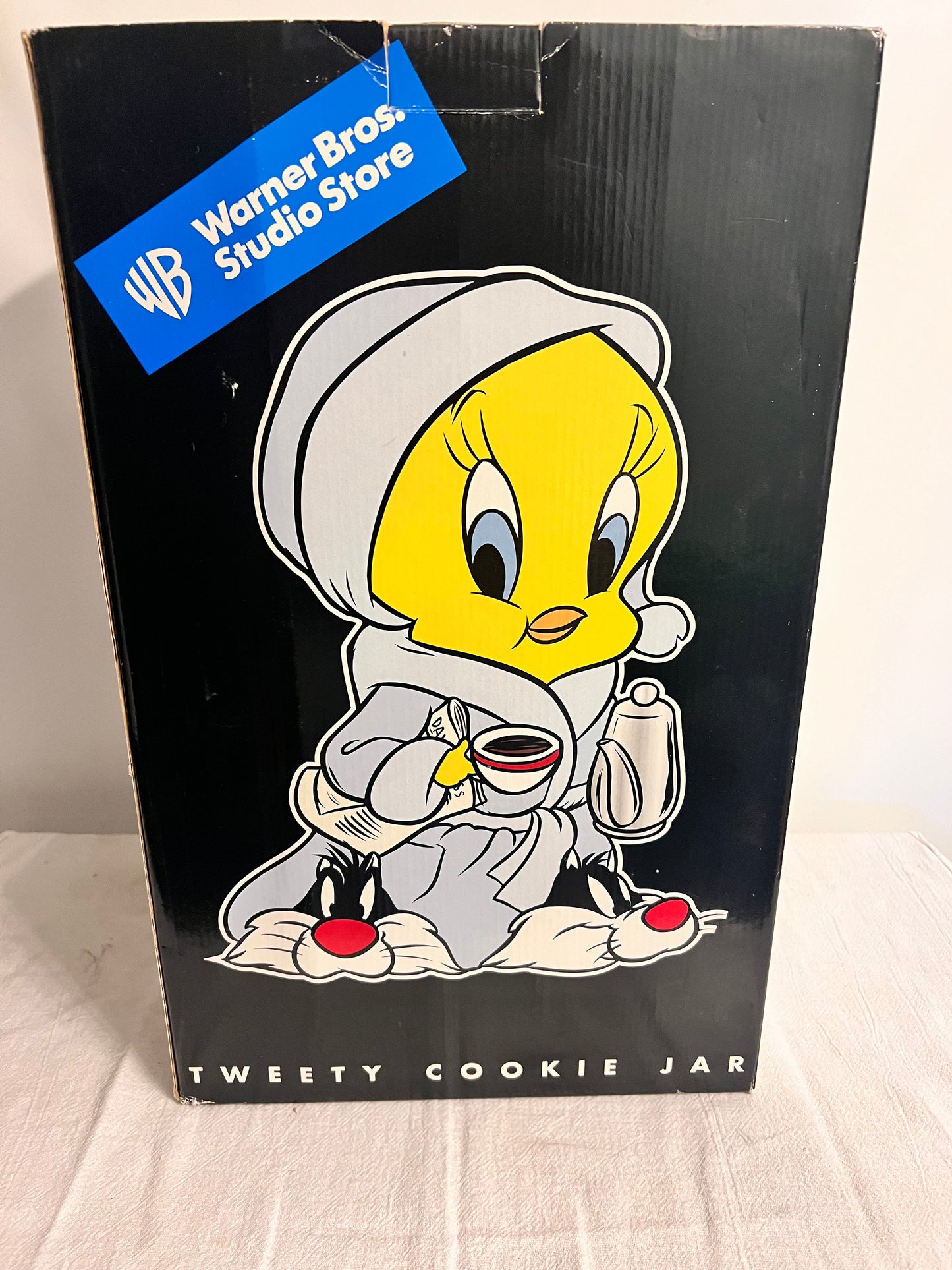 Tweety Bird- 13 1/2” cookie jar -Warner brothers- Looney Tunes- bathrobe and Sylvester slippers- with original box