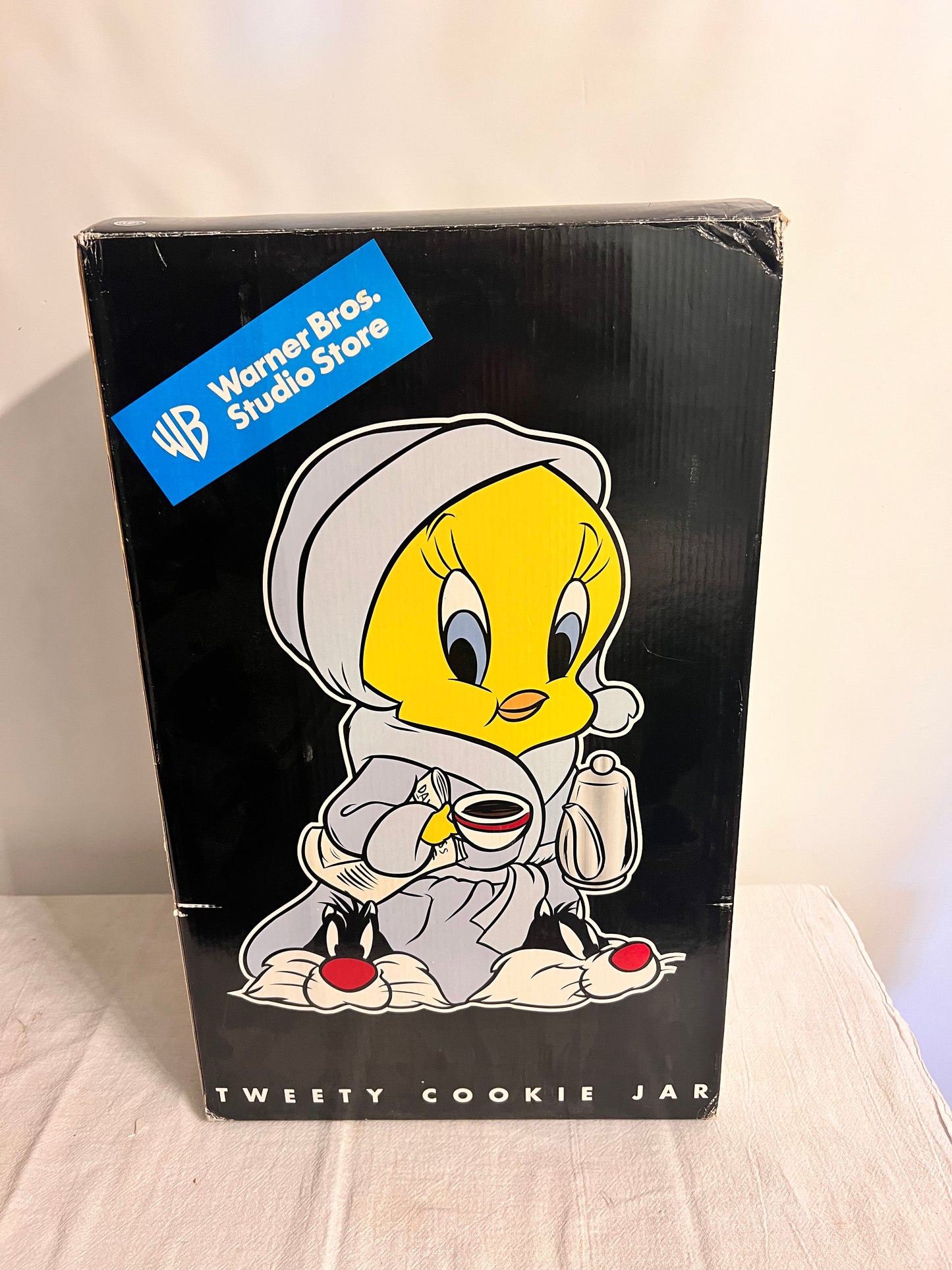 Tweety Bird- 13 1/2” cookie jar -Warner brothers- Looney Tunes- bathrobe and Sylvester slippers- with original box