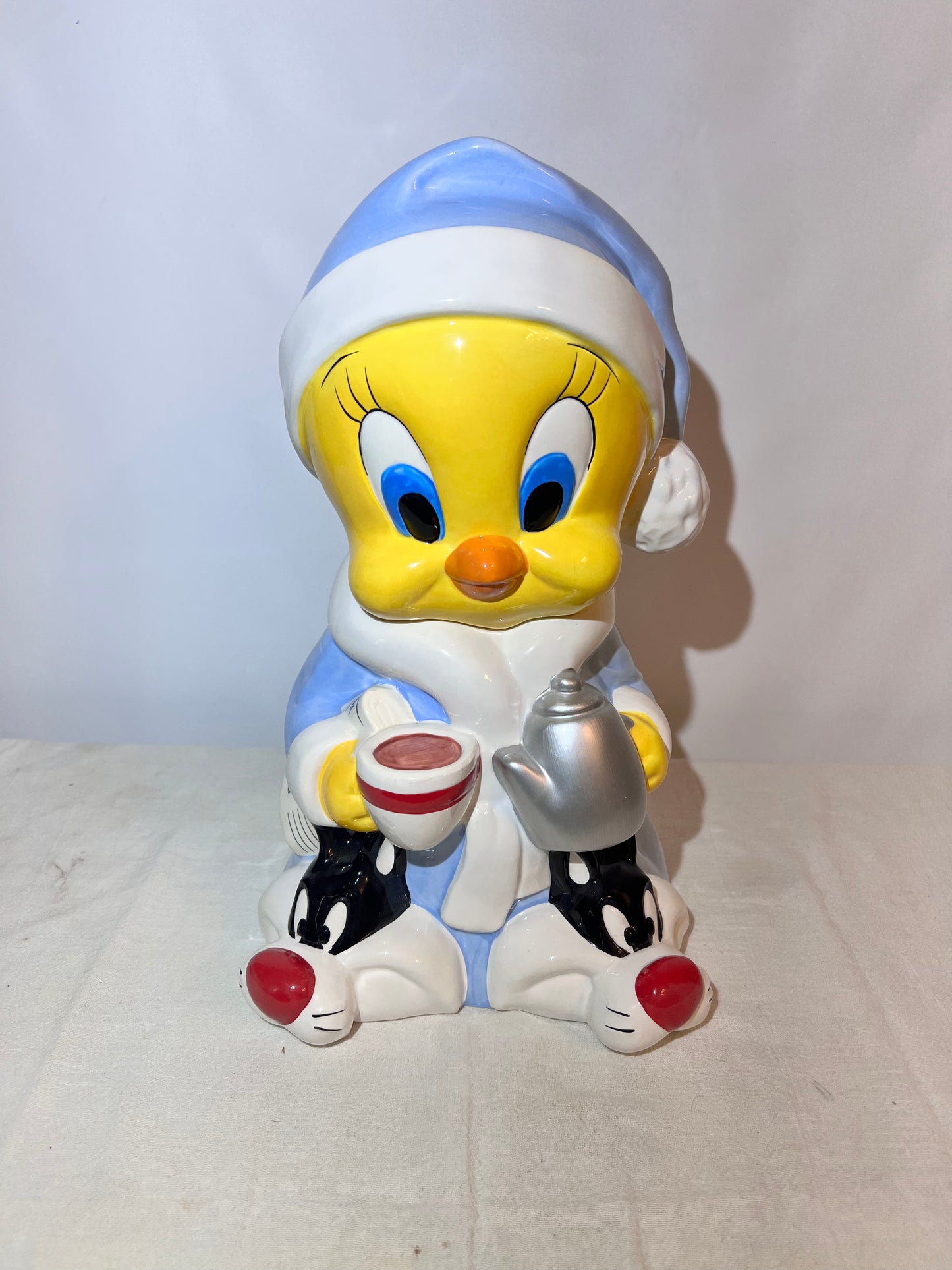 Tweety Bird- 13 1/2” cookie jar -Warner brothers- Looney Tunes- bathrobe and Sylvester slippers- with original box