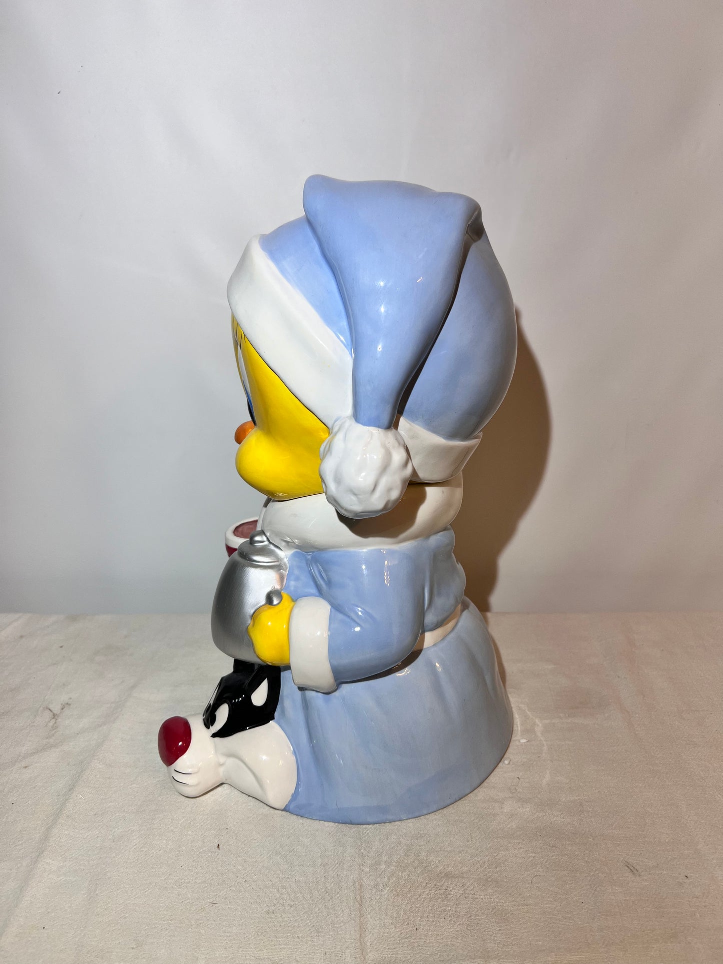 Tweety Bird- 13 1/2” cookie jar -Warner brothers- Looney Tunes- bathrobe and Sylvester slippers- with original box