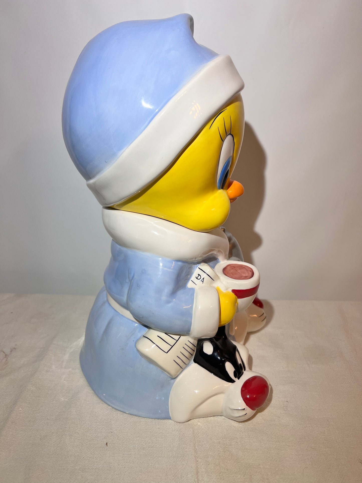 Tweety Bird- 13 1/2” cookie jar -Warner brothers- Looney Tunes- bathrobe and Sylvester slippers- with original box