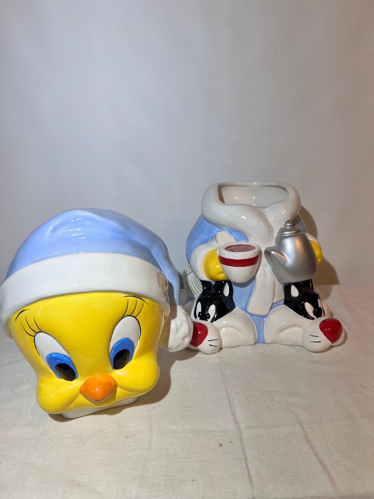 Tweety Bird- 13 1/2” cookie jar -Warner brothers- Looney Tunes- bathrobe and Sylvester slippers- with original box