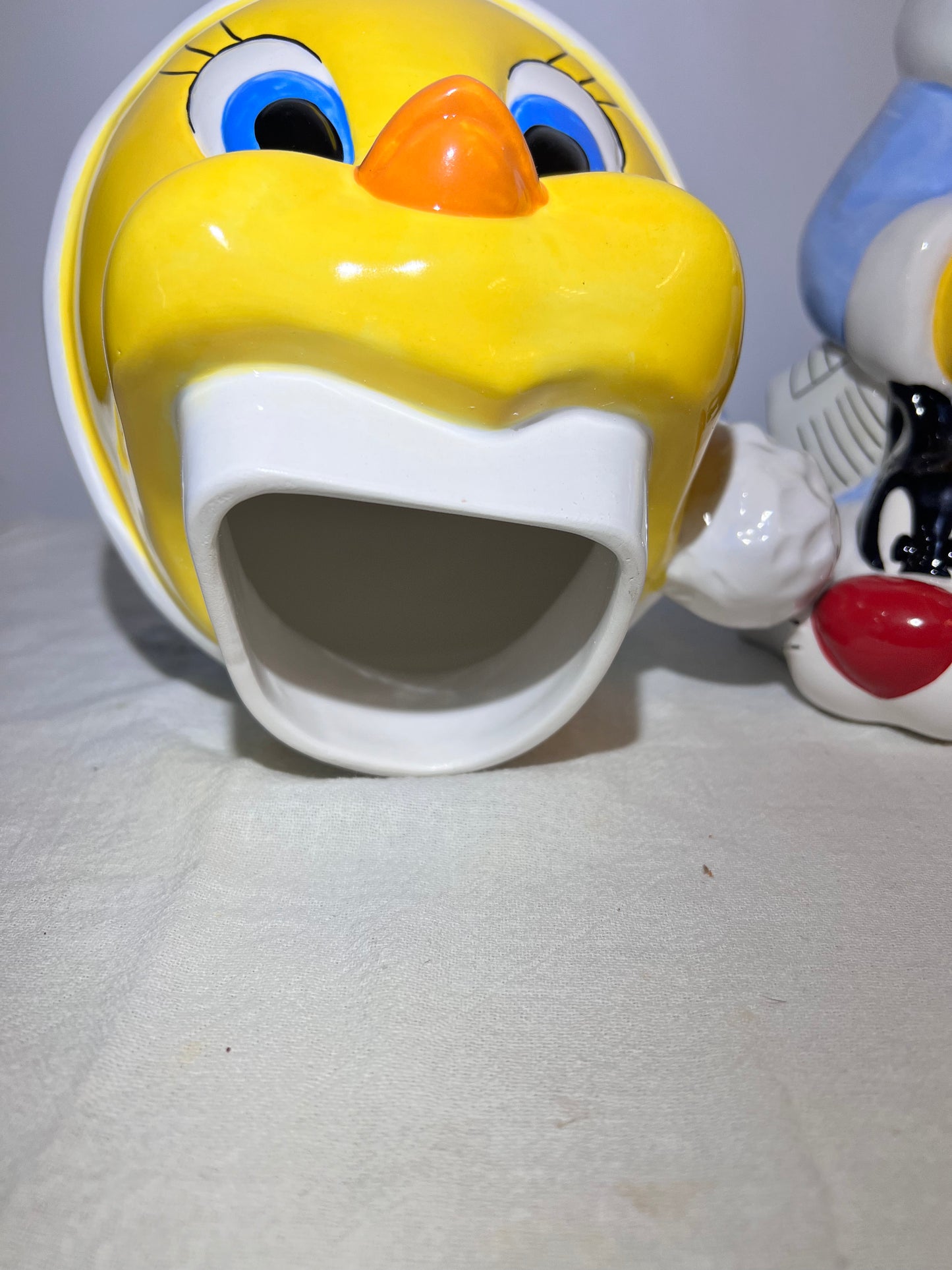 Tweety Bird- 13 1/2” cookie jar -Warner brothers- Looney Tunes- bathrobe and Sylvester slippers- with original box