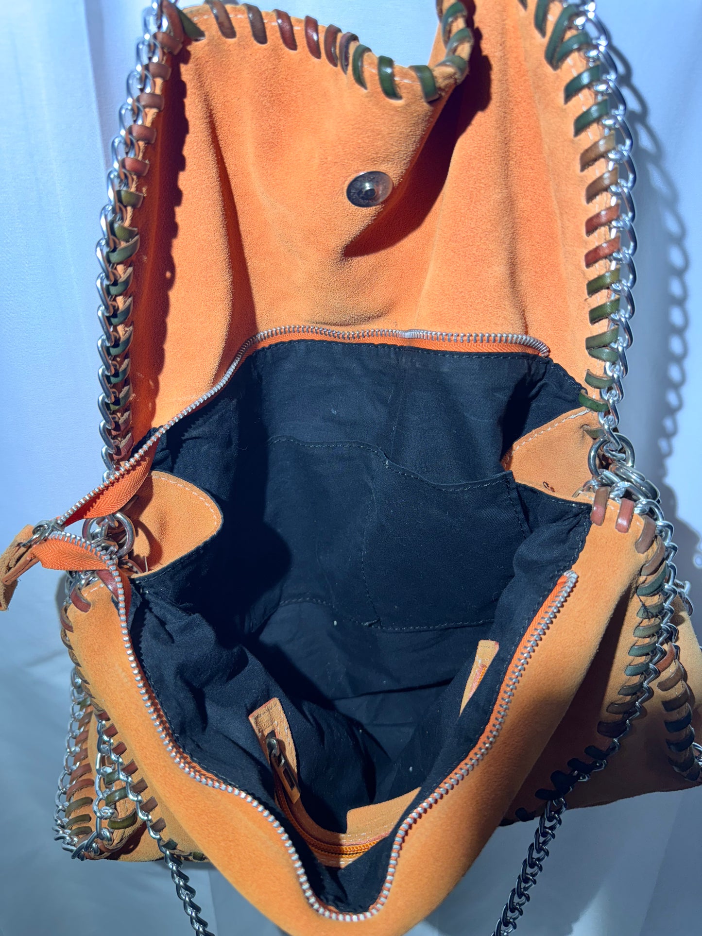 Stylish Orange Leather Handbag with Chain Straps – Gently Used