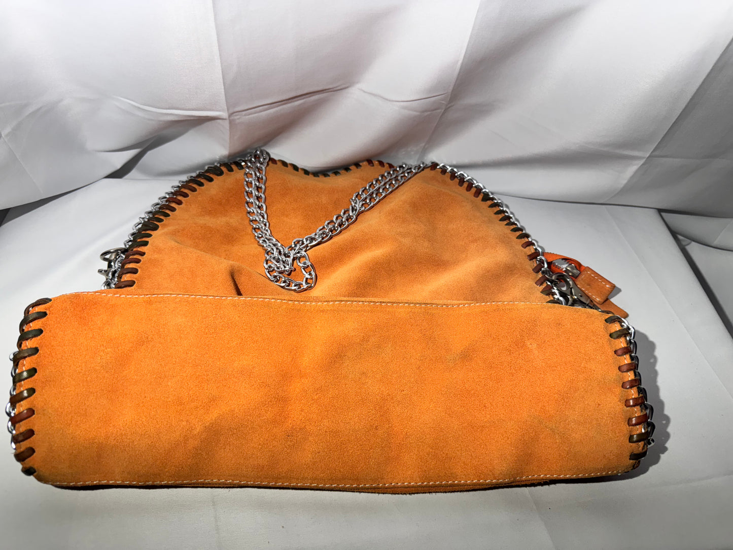 Stylish Orange Leather Handbag with Chain Straps – Gently Used