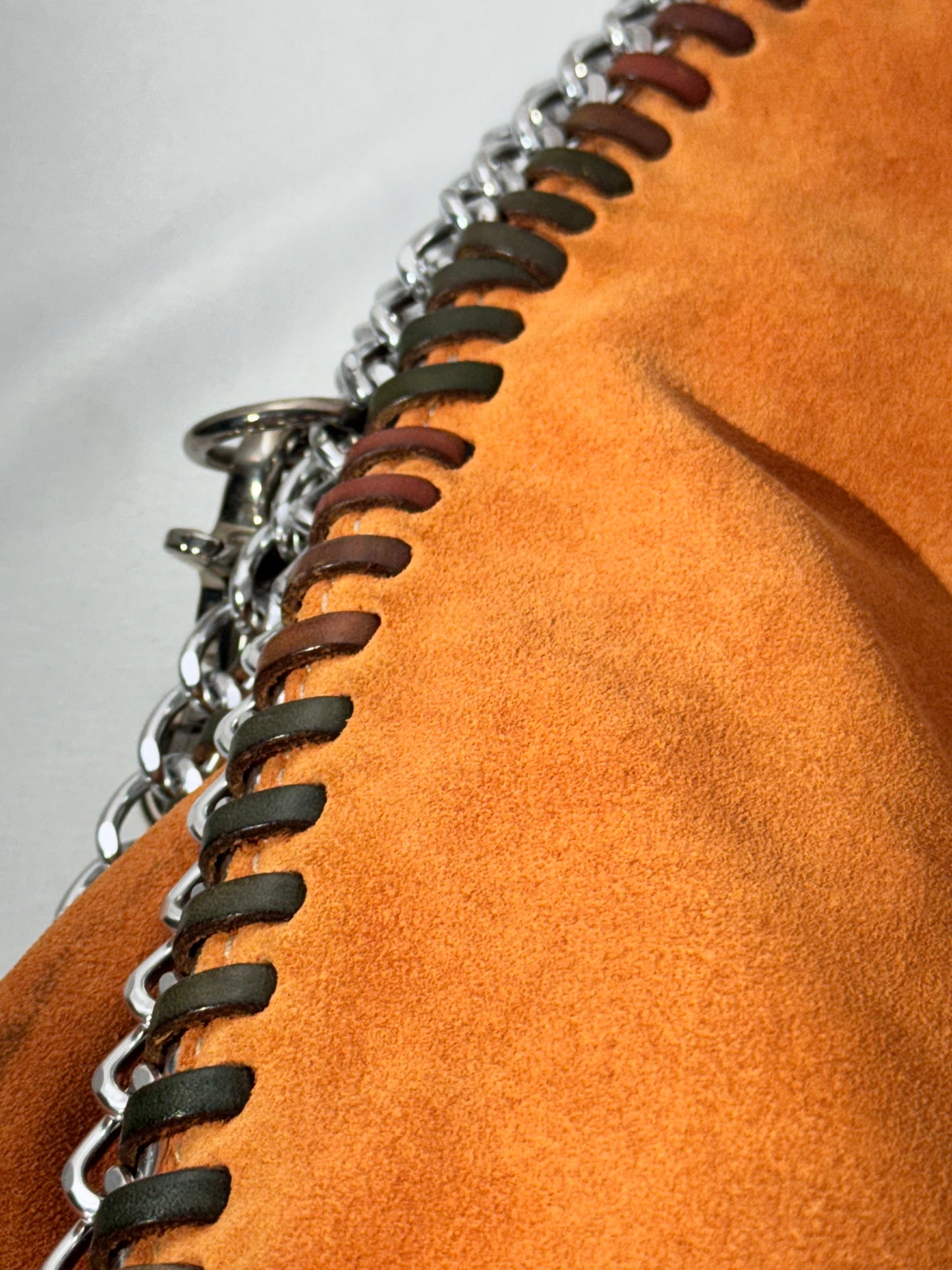 Stylish Orange Leather Handbag with Chain Straps – Gently Used
