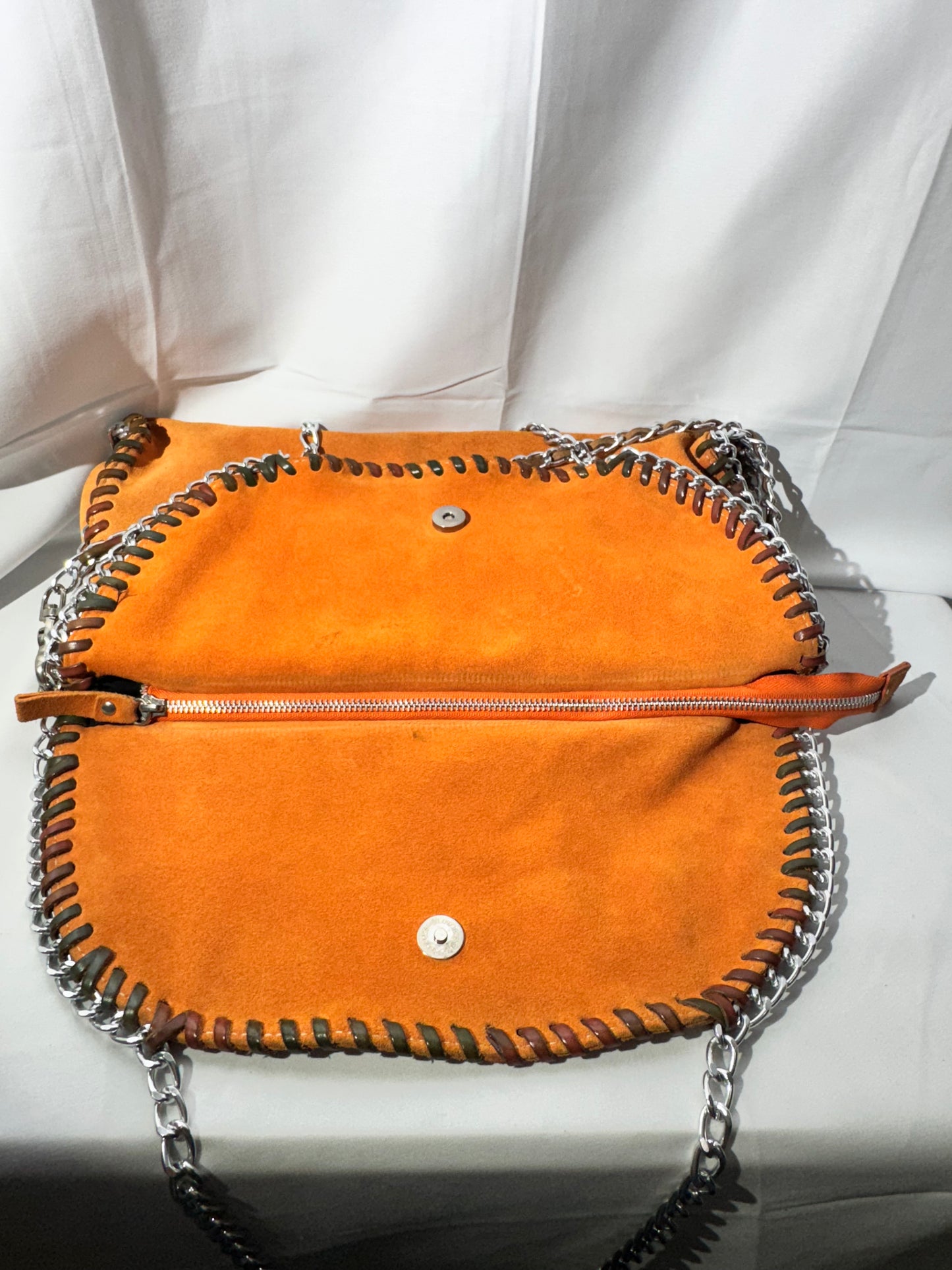 Stylish Orange Leather Handbag with Chain Straps – Gently Used