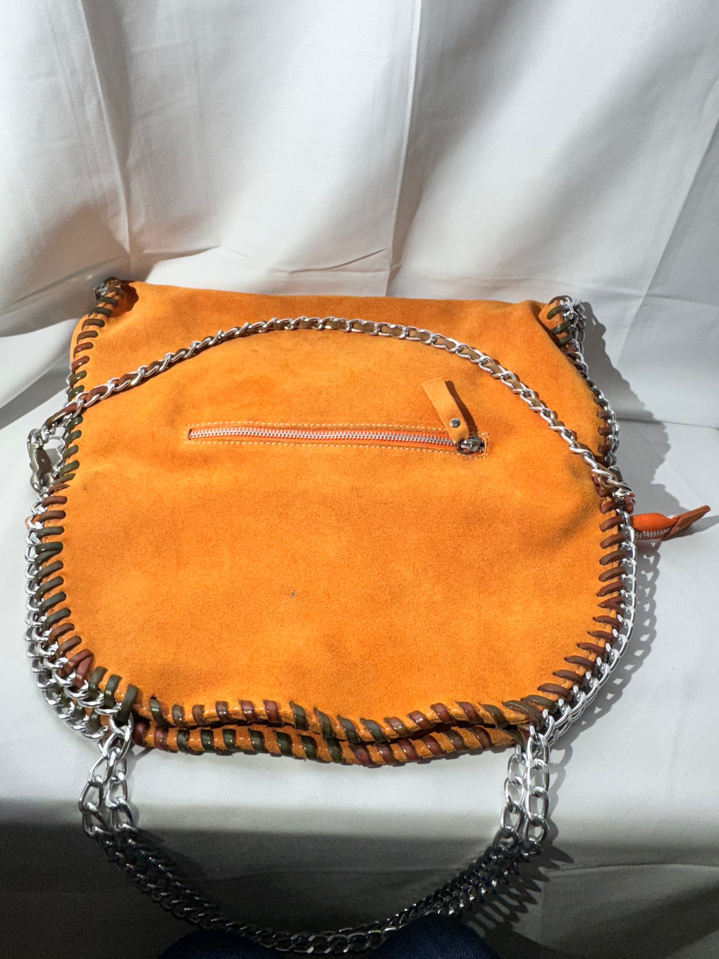 Stylish Orange Leather Handbag with Chain Straps – Gently Used