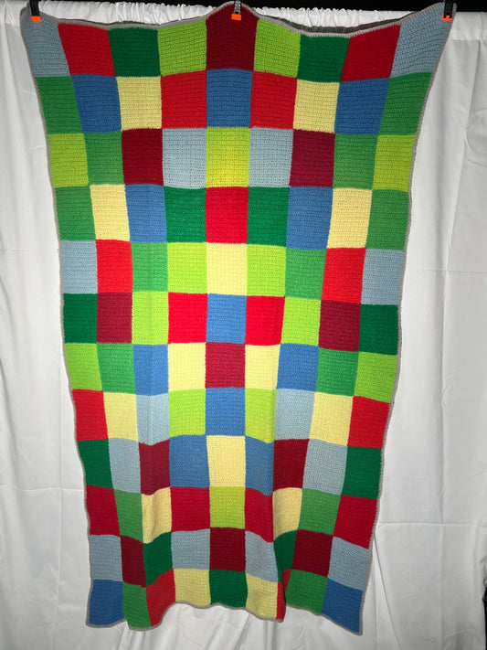 Afghan - multi-colored - 40” x 69” - blue,green,red, yellow- small squares -hand crochet blanket