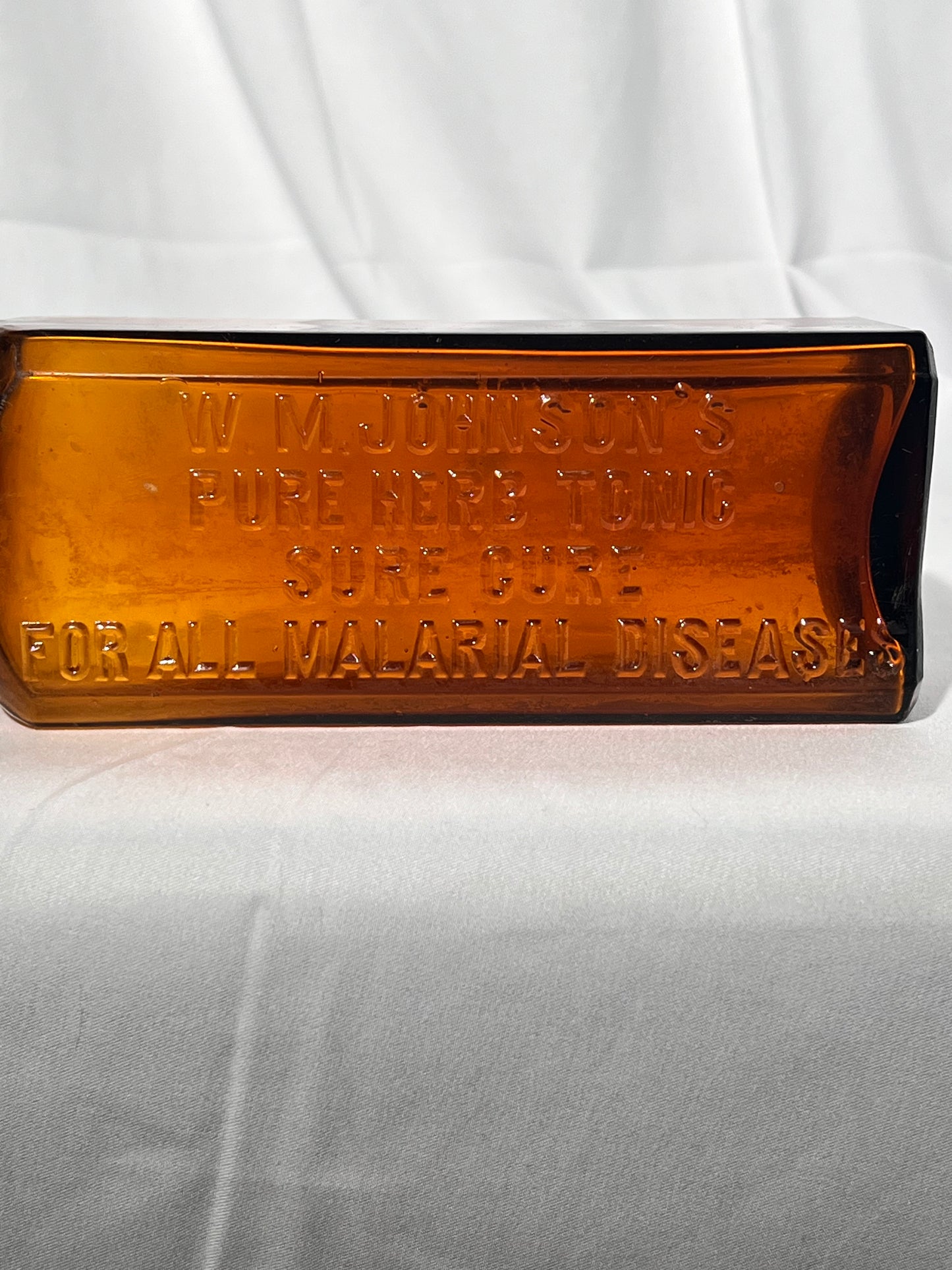 Antique Medicine Bottle - 9” W.M. Johnson’s - Pure Herb Tonic- Sure Cure - For All Malarial Diseases - Amber glass